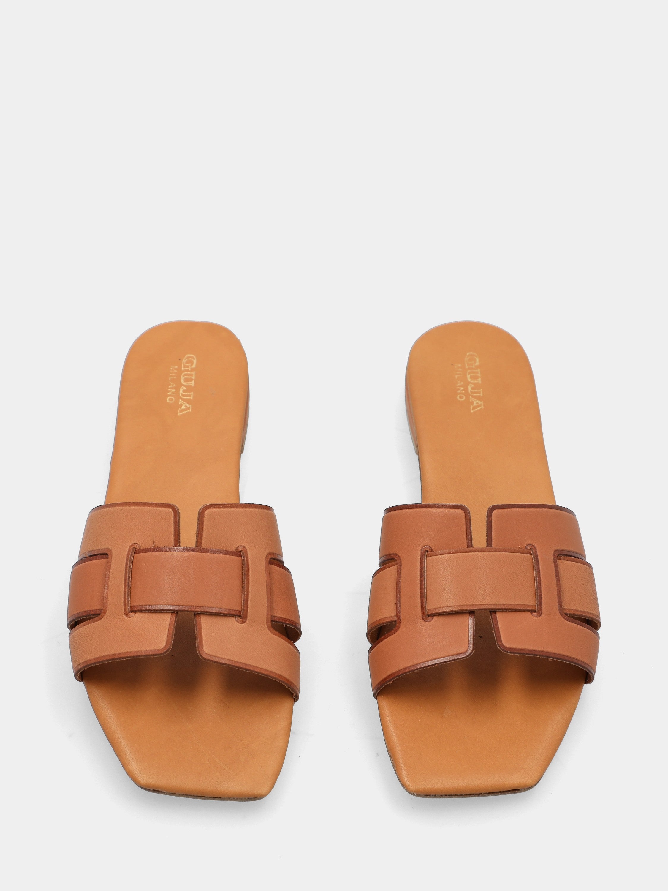 Calf leather slipper with braided straps and square toe