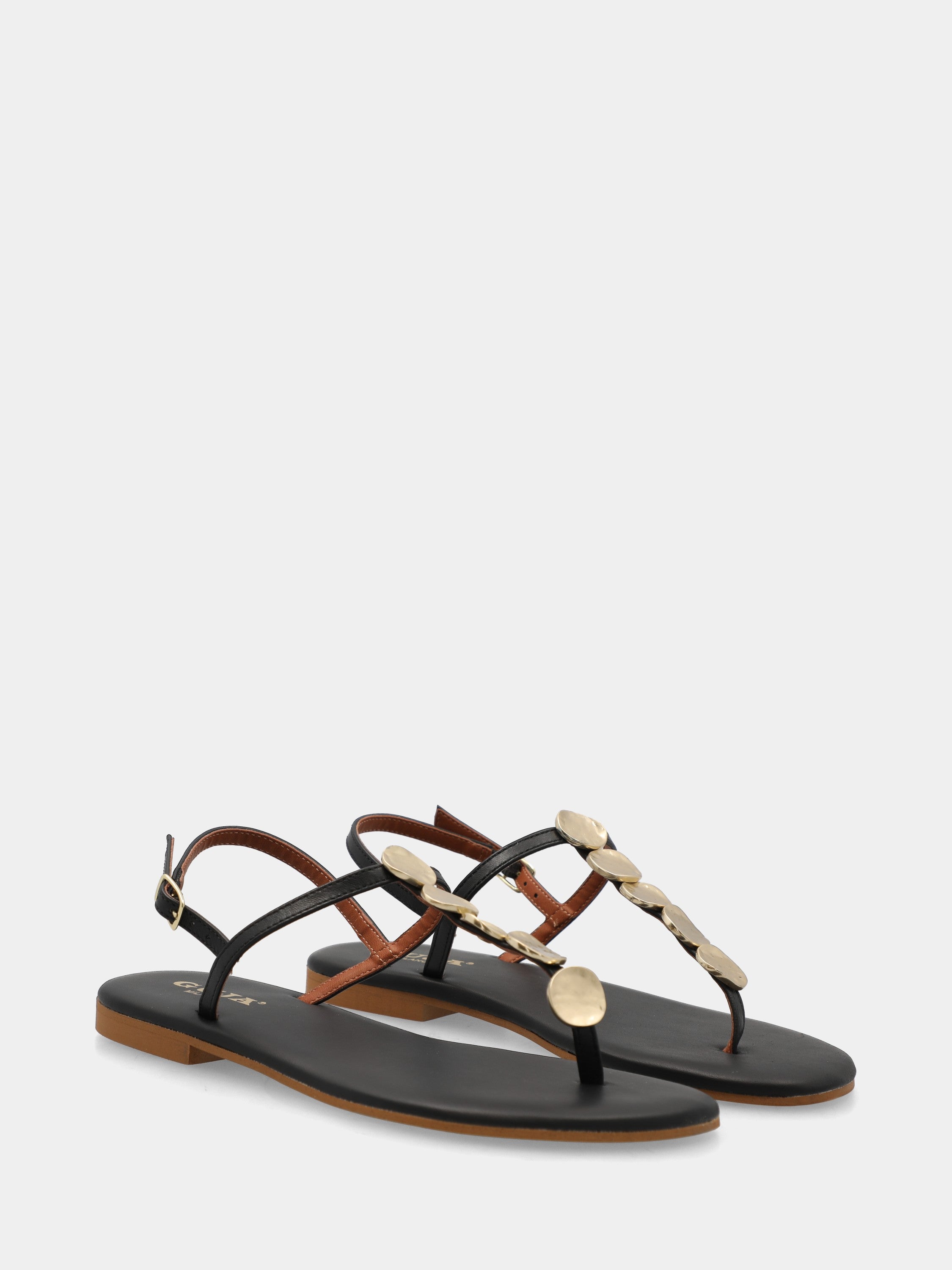 Infradito in vitello nero con placchette metalliche e suola flat