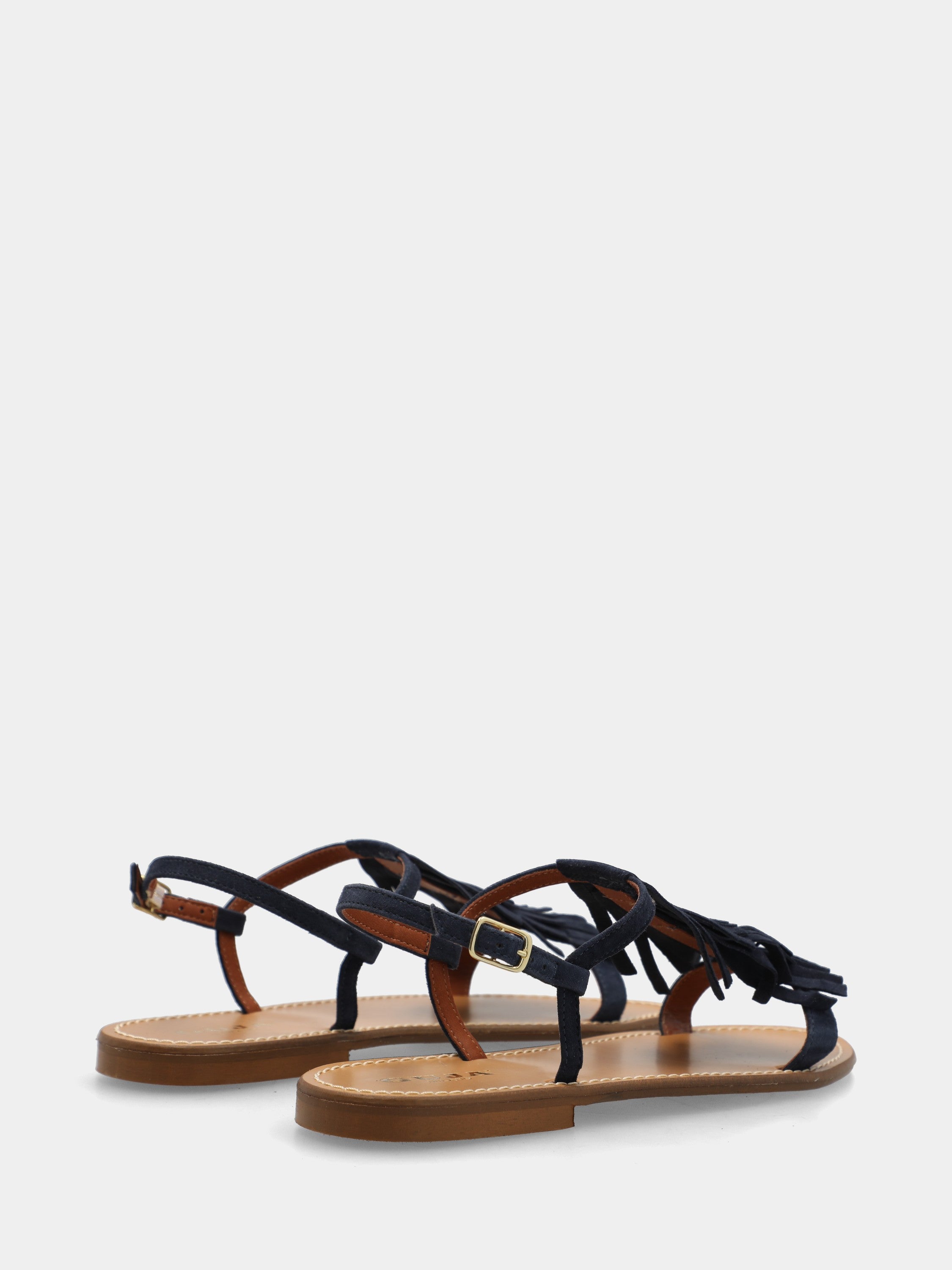 Sandalo flat in camoscio blu con frange sul collo del piede