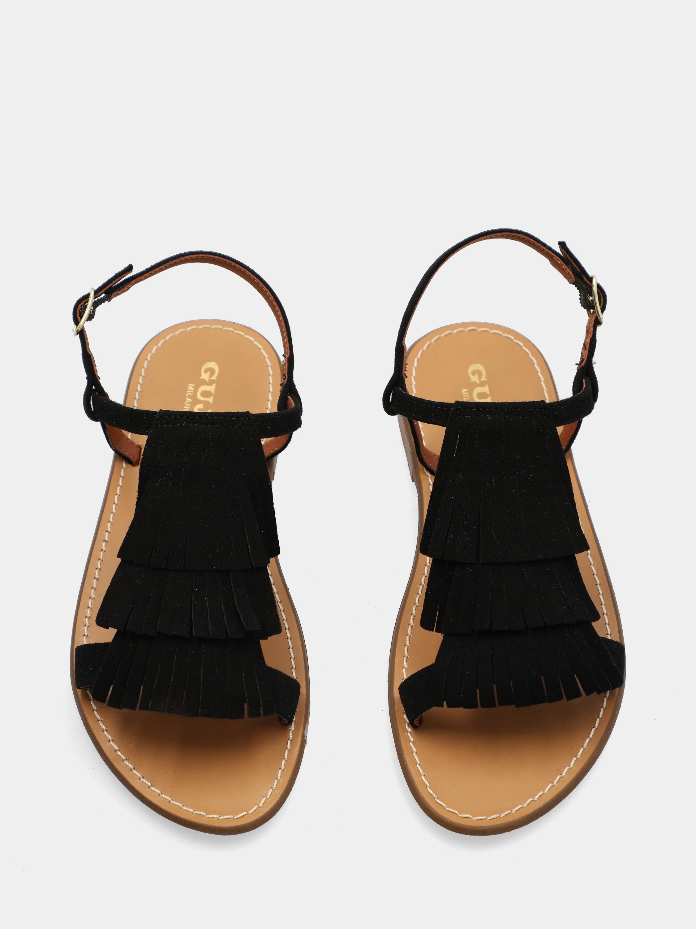 Sandalo flat in camoscio nero con frange sul collo del piede