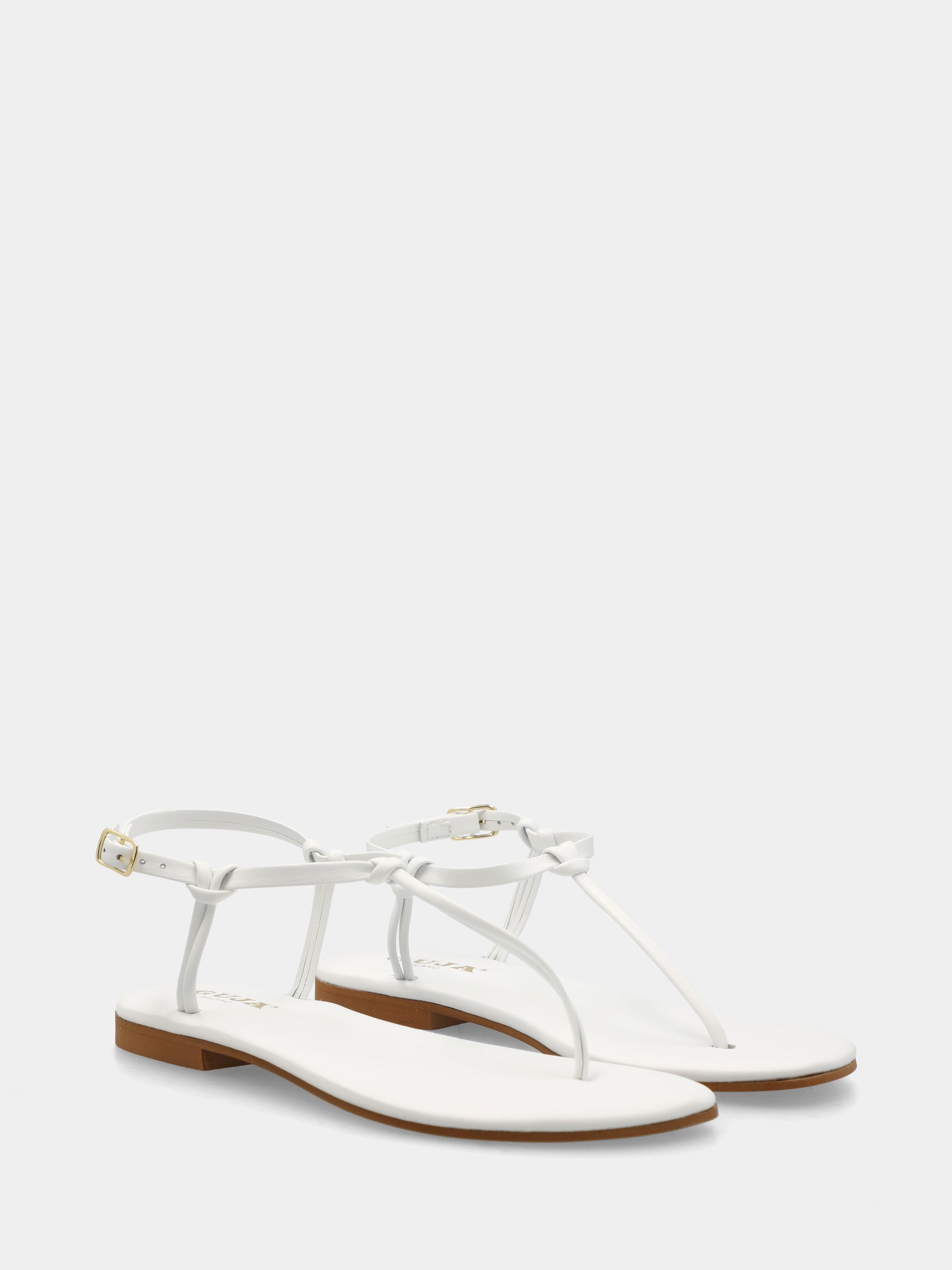 Tongs en nappa blanche avec lacets tubulaires et bride à la cheville