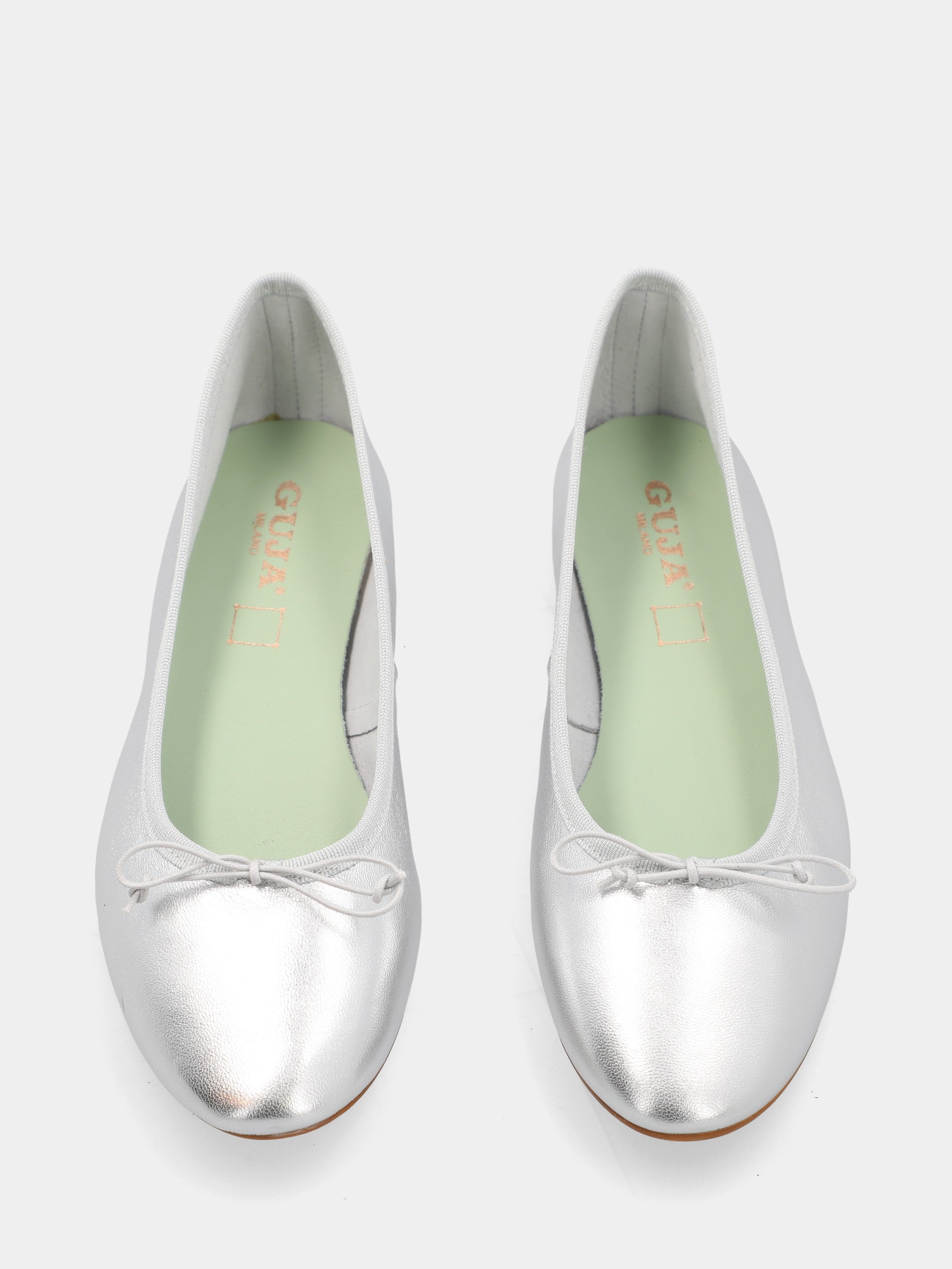 Silver laminated ballet flat with tie at the neckline