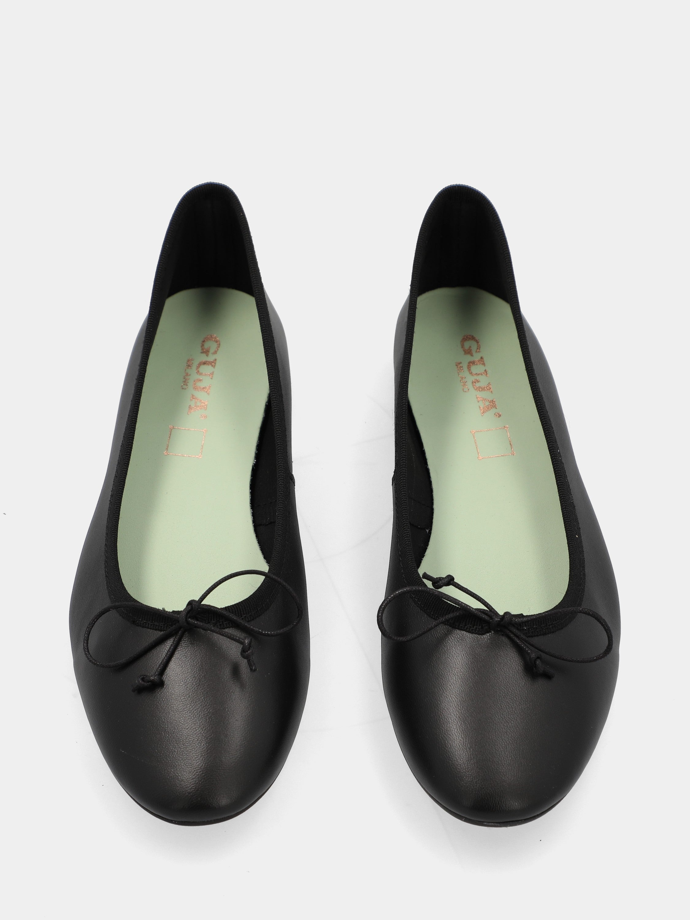 Black nappa ballet flat with tie at the neckline