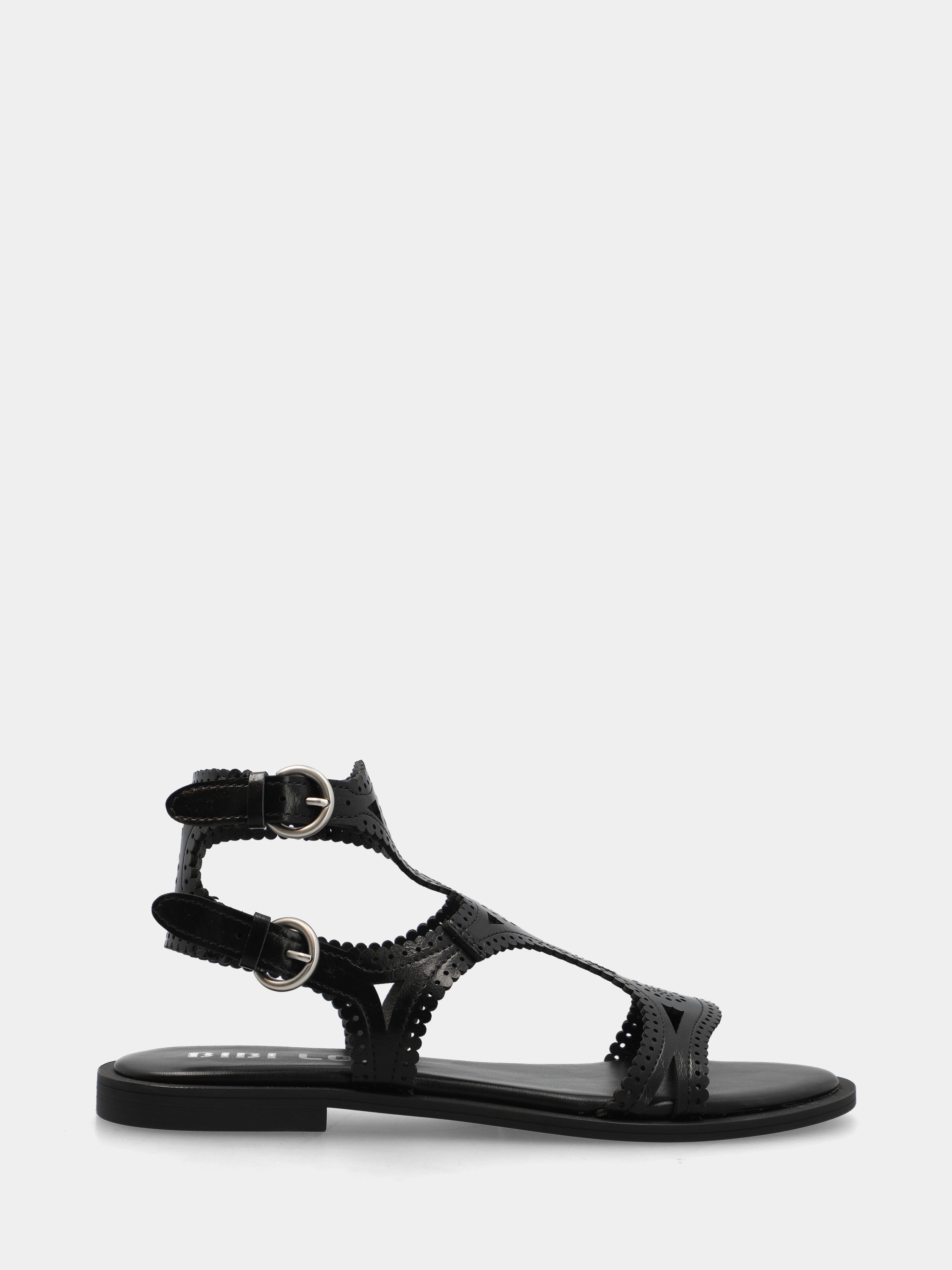 Sandalo in vitello nero con fasce trafogate