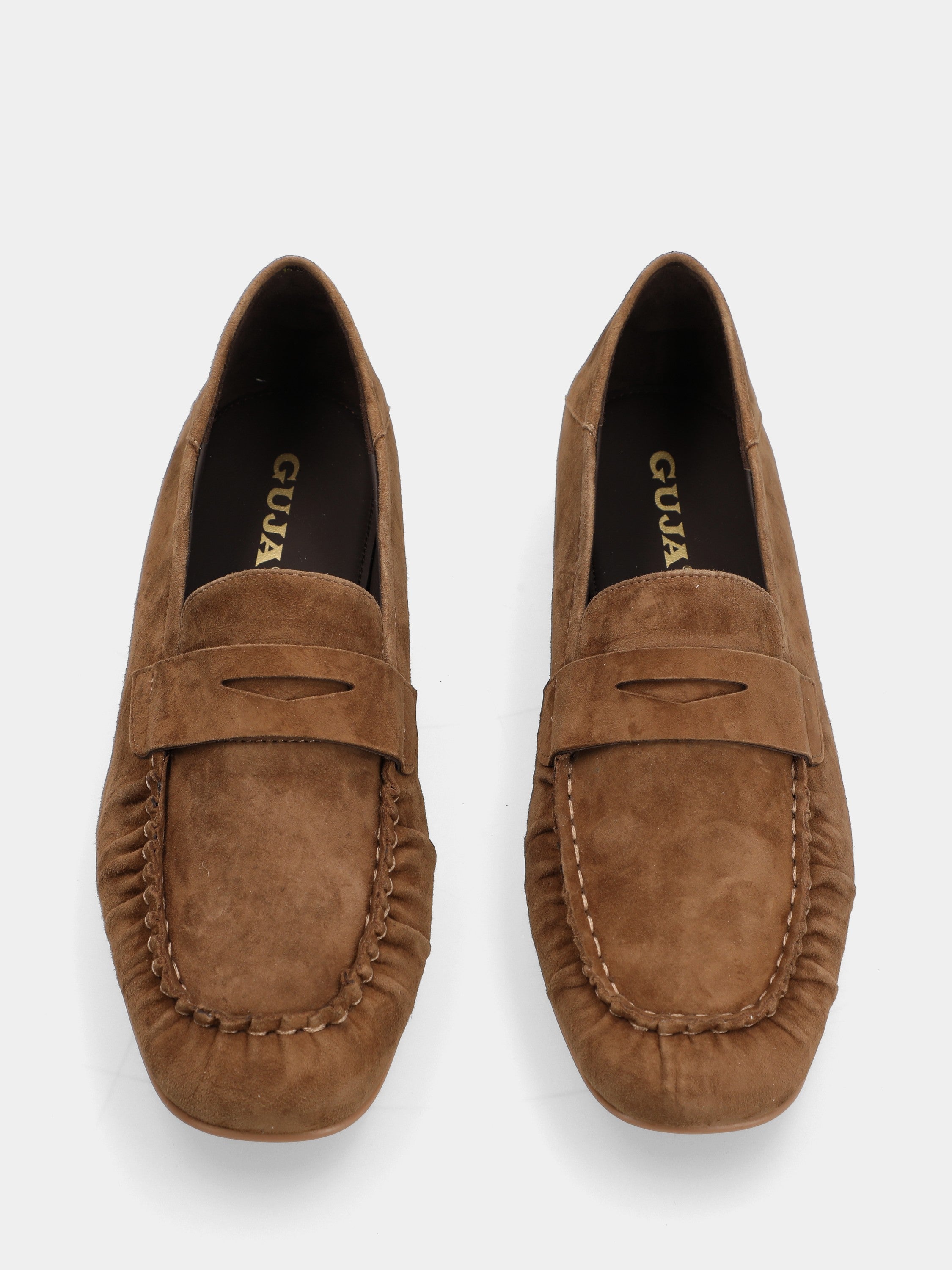 Mocassin en suède marron avec masque en forme de bouche de lion