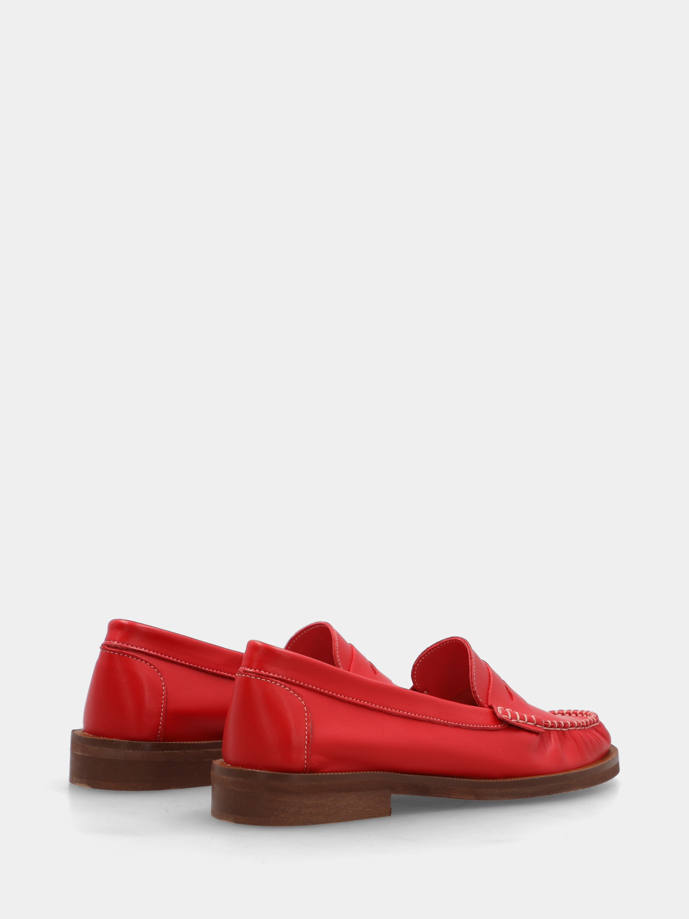 Mocassin en veau rouge avec masque en forme de bouche de lion