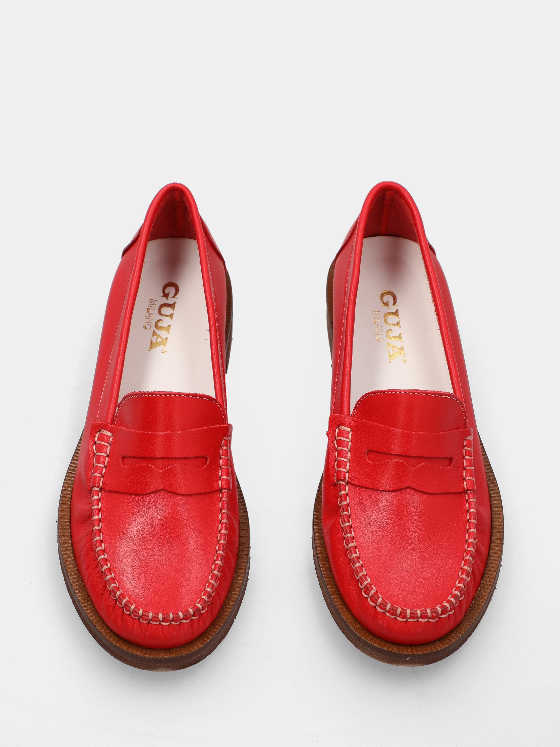 Mocassin en veau rouge avec masque en forme de bouche de lion