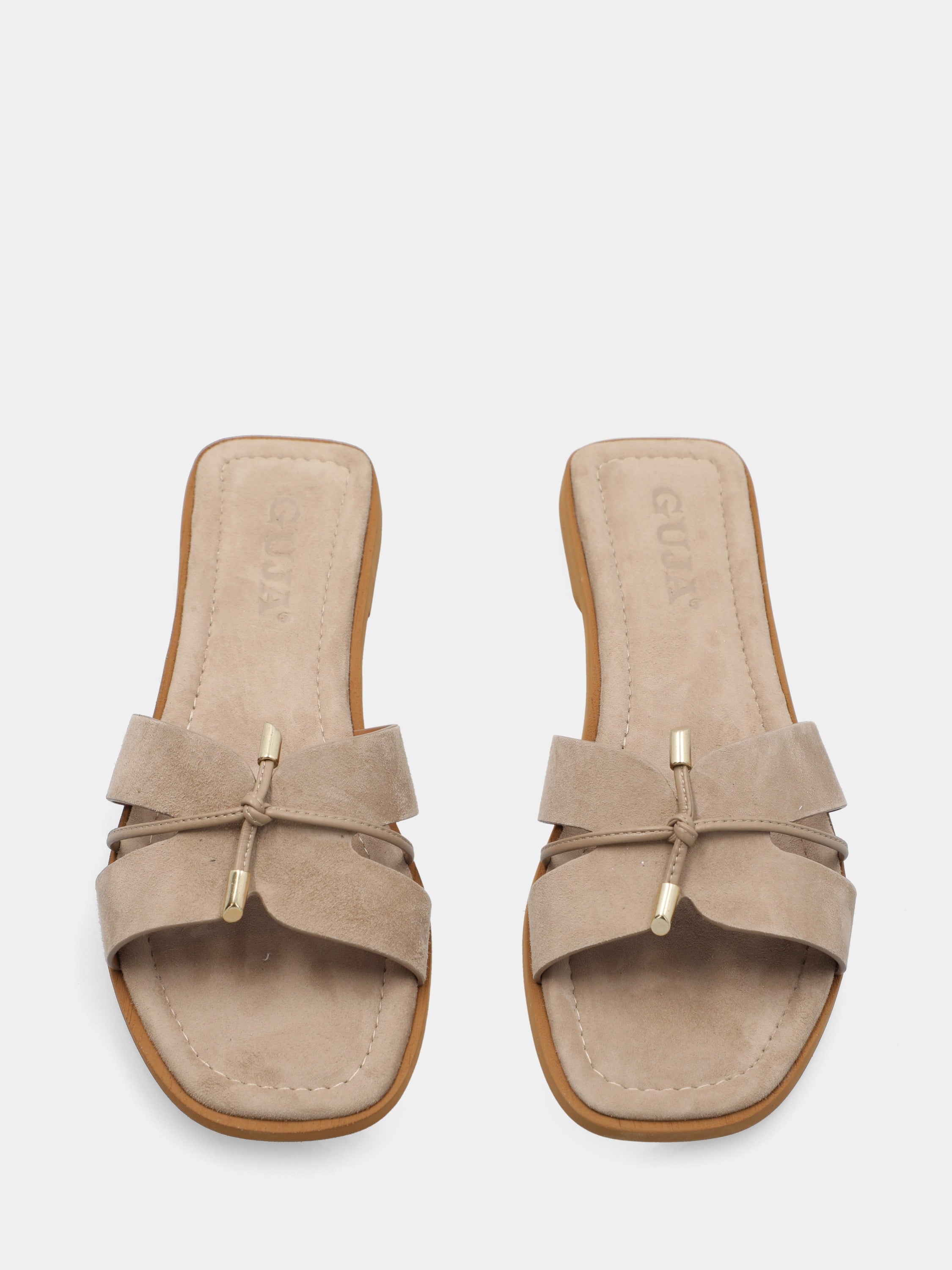 Ciabattina in camoscio beige con tomaia a ics
