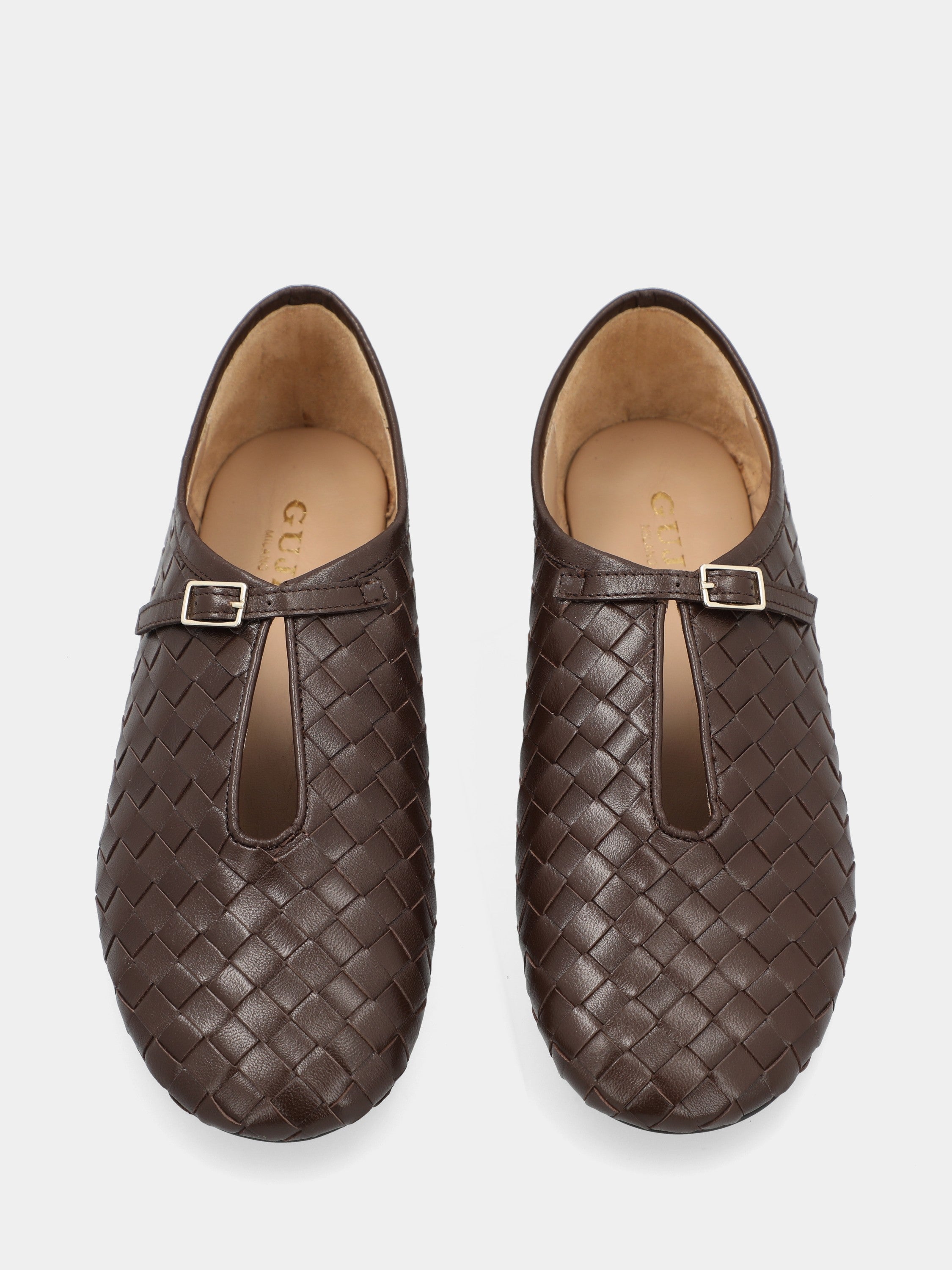 Ballet flat in dark brown calfskin with strap and round toe