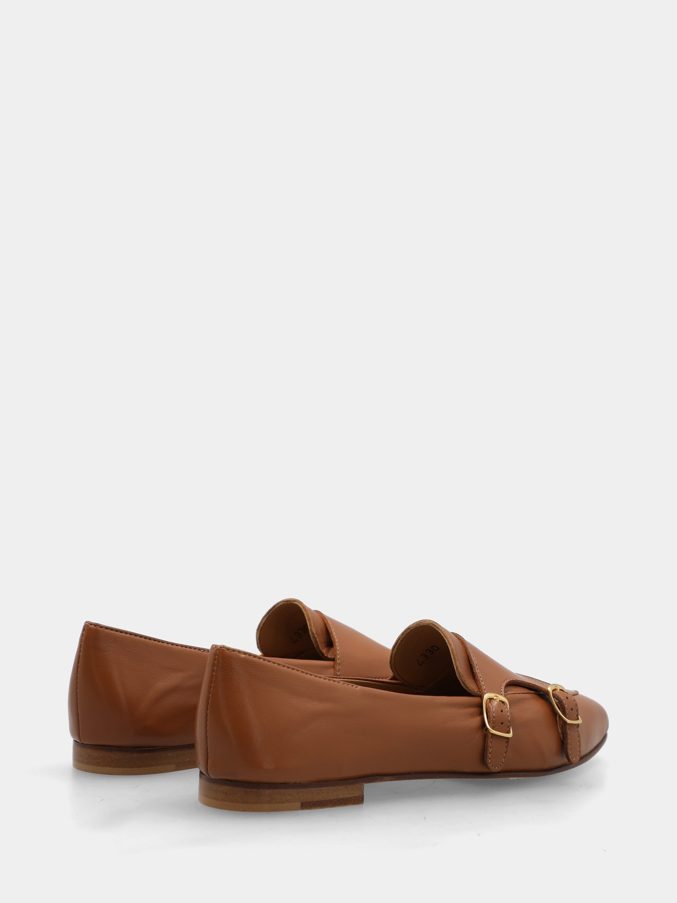 Calf leather moccasin in leather color with sacchetto construction and double buckles