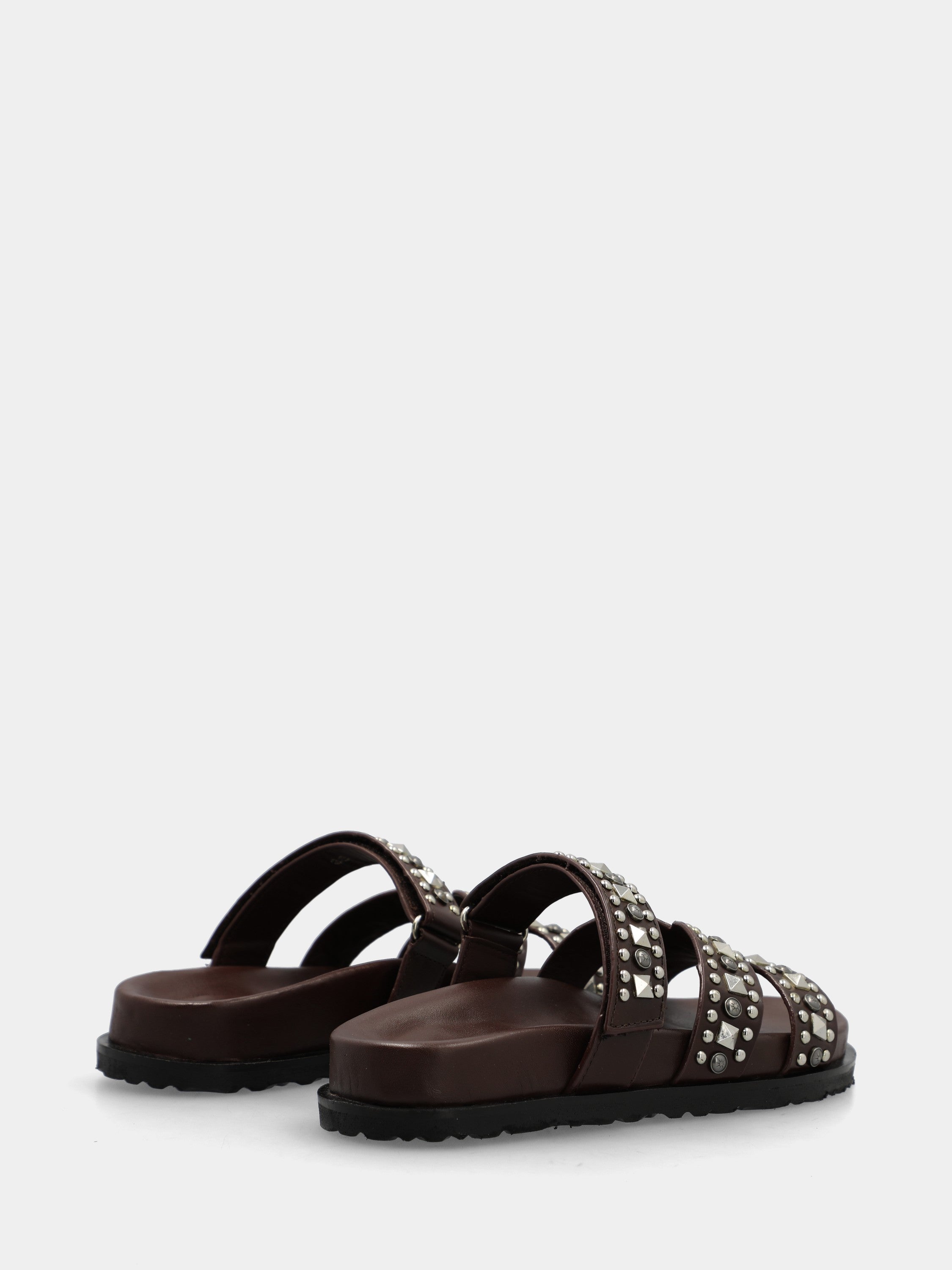 Slide sandal with dark brown calf leather footbed, X straps, and Velcro closure