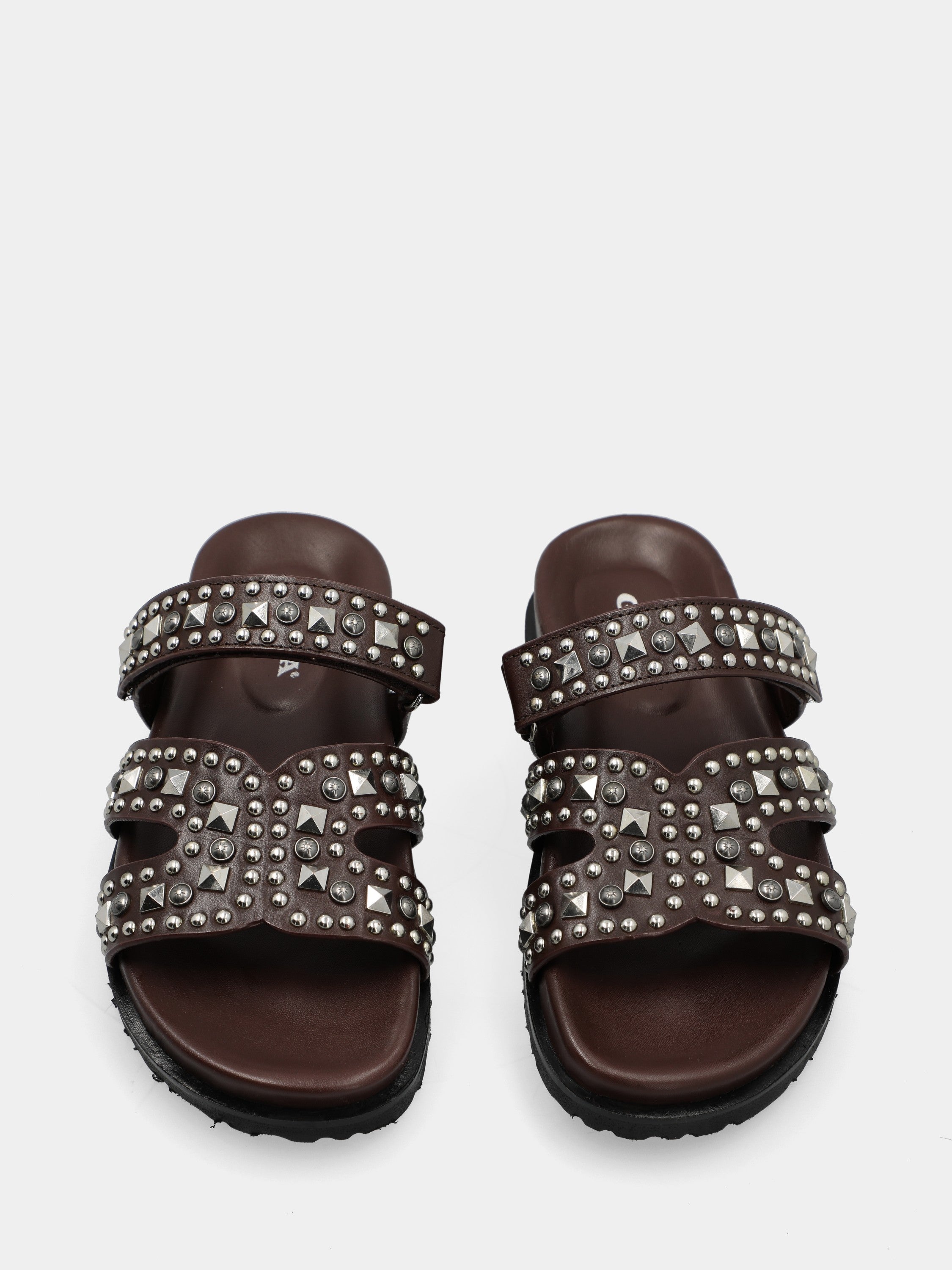 Slide sandal with dark brown calf leather footbed, X straps, and Velcro closure