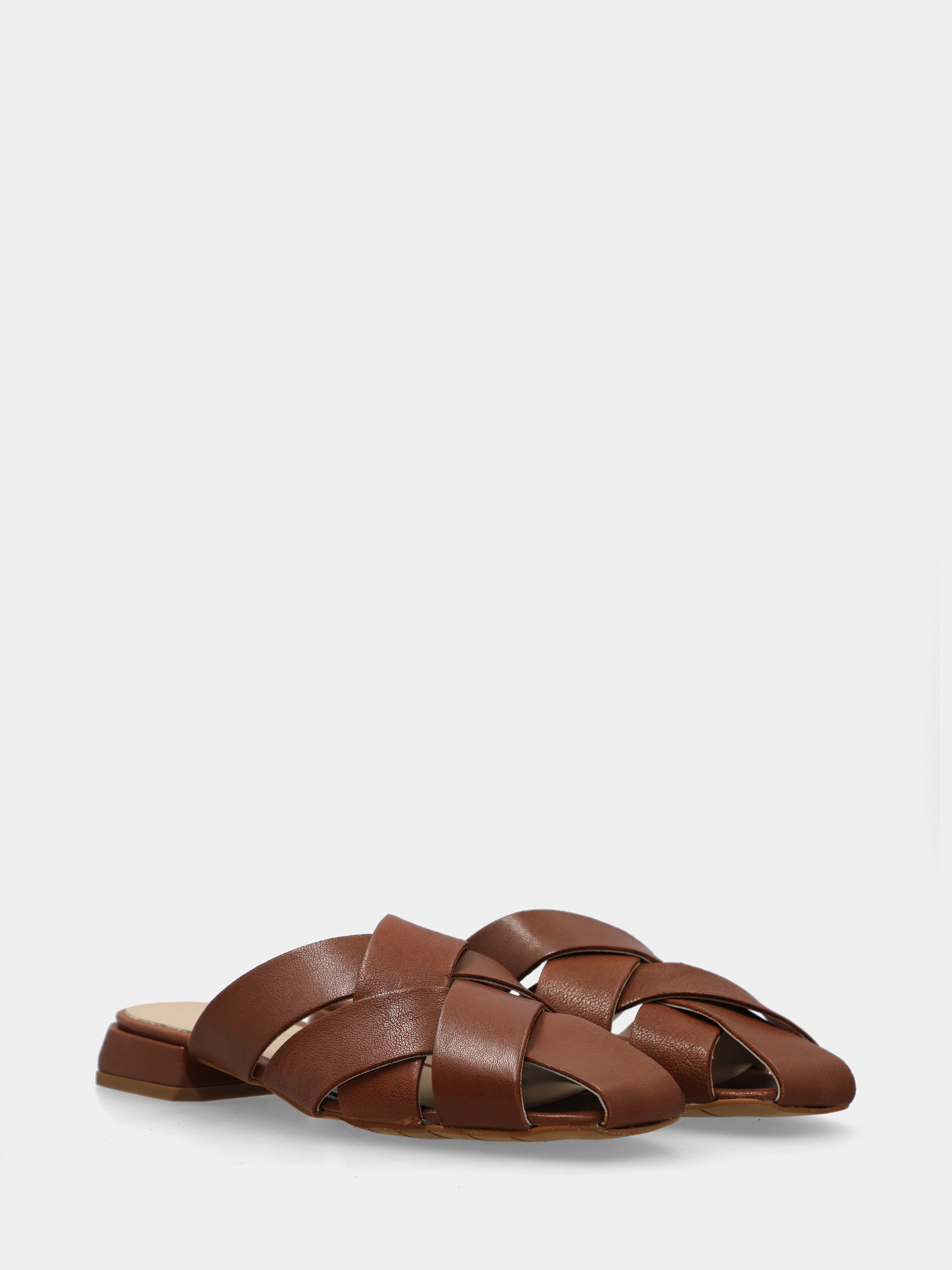 Leather nappa slipper in tan color with crossed straps and square toe