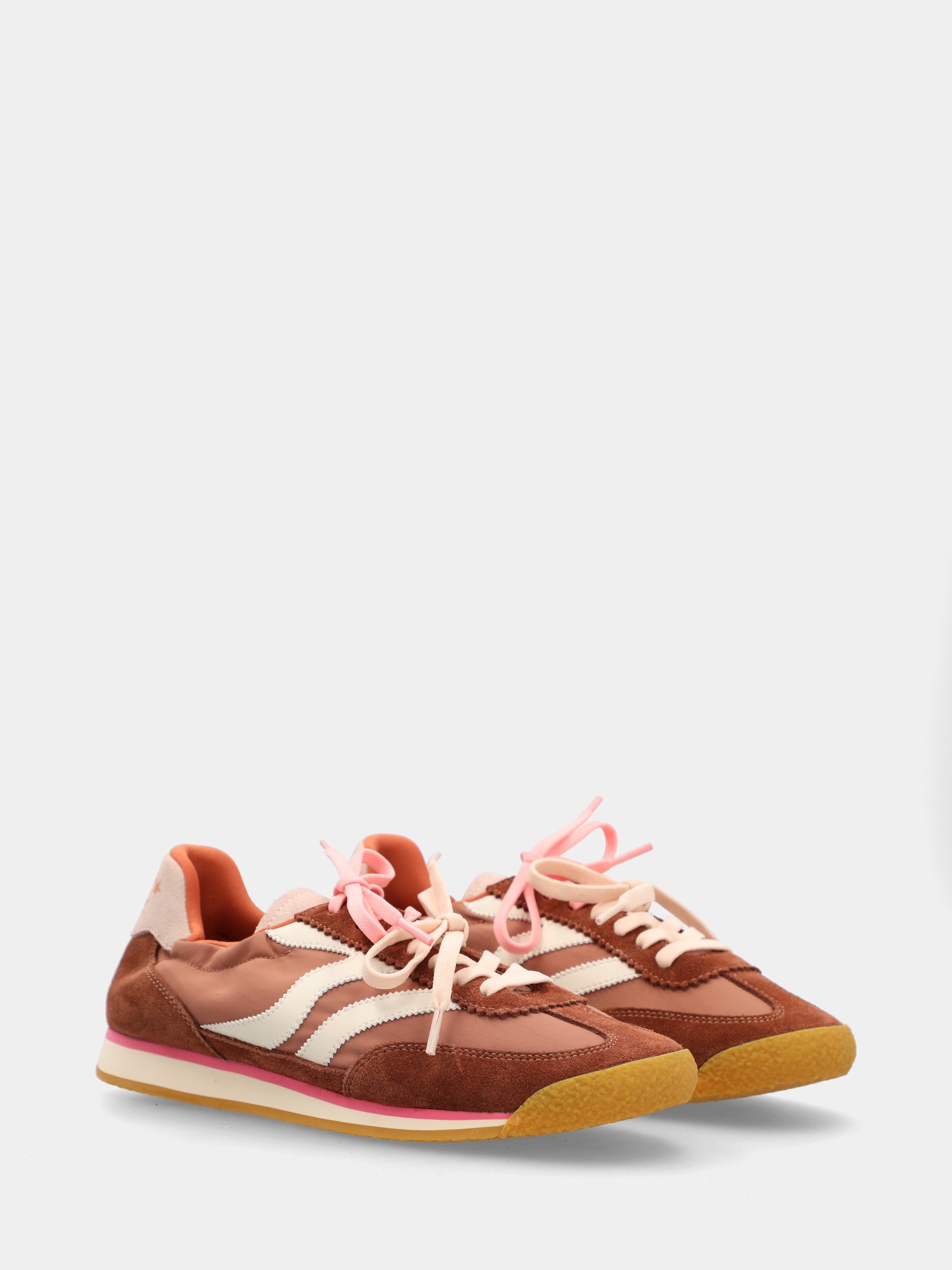 Suede sneakers with white and brown accents