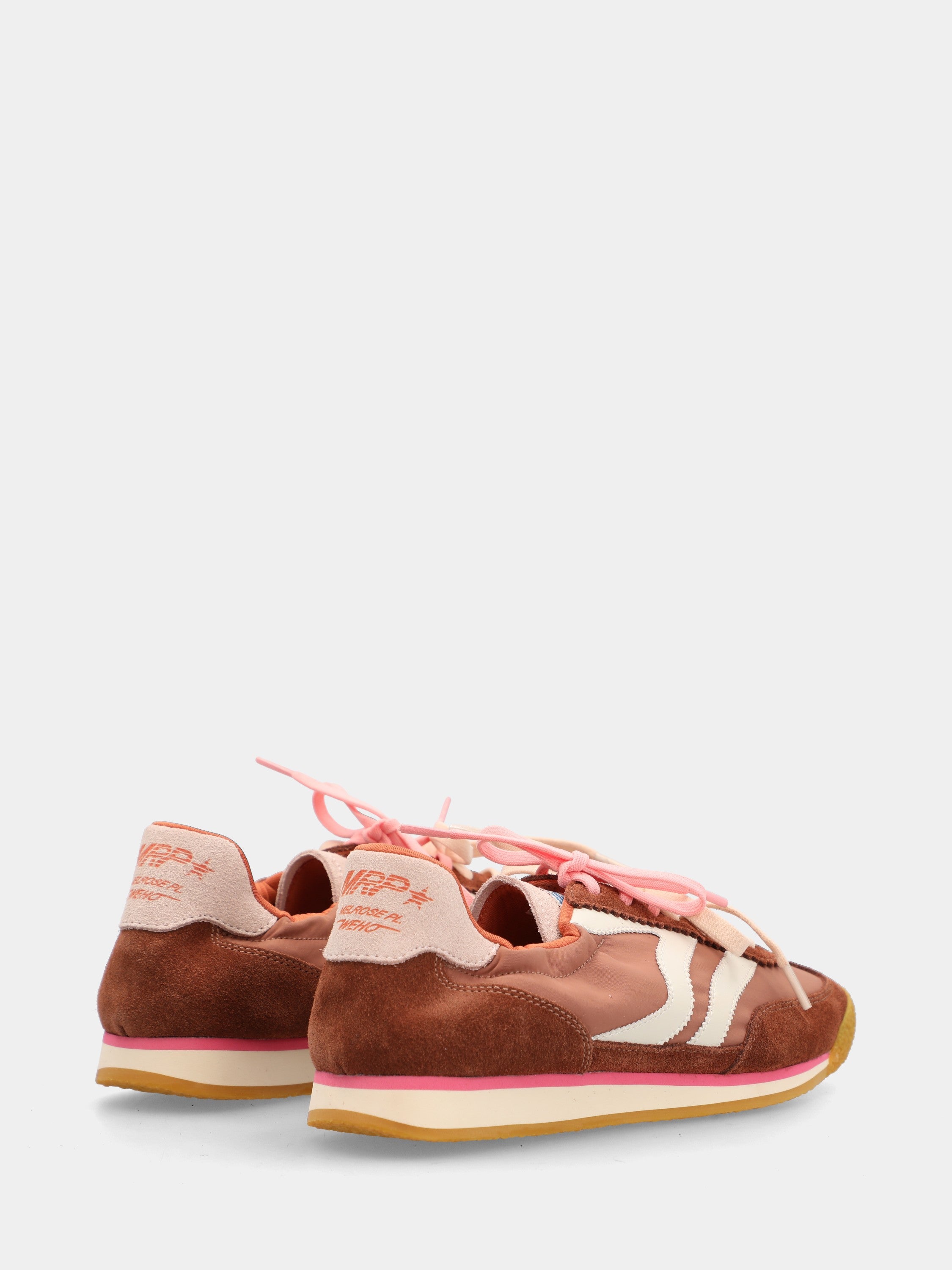 Suede sneakers with white and brown accents