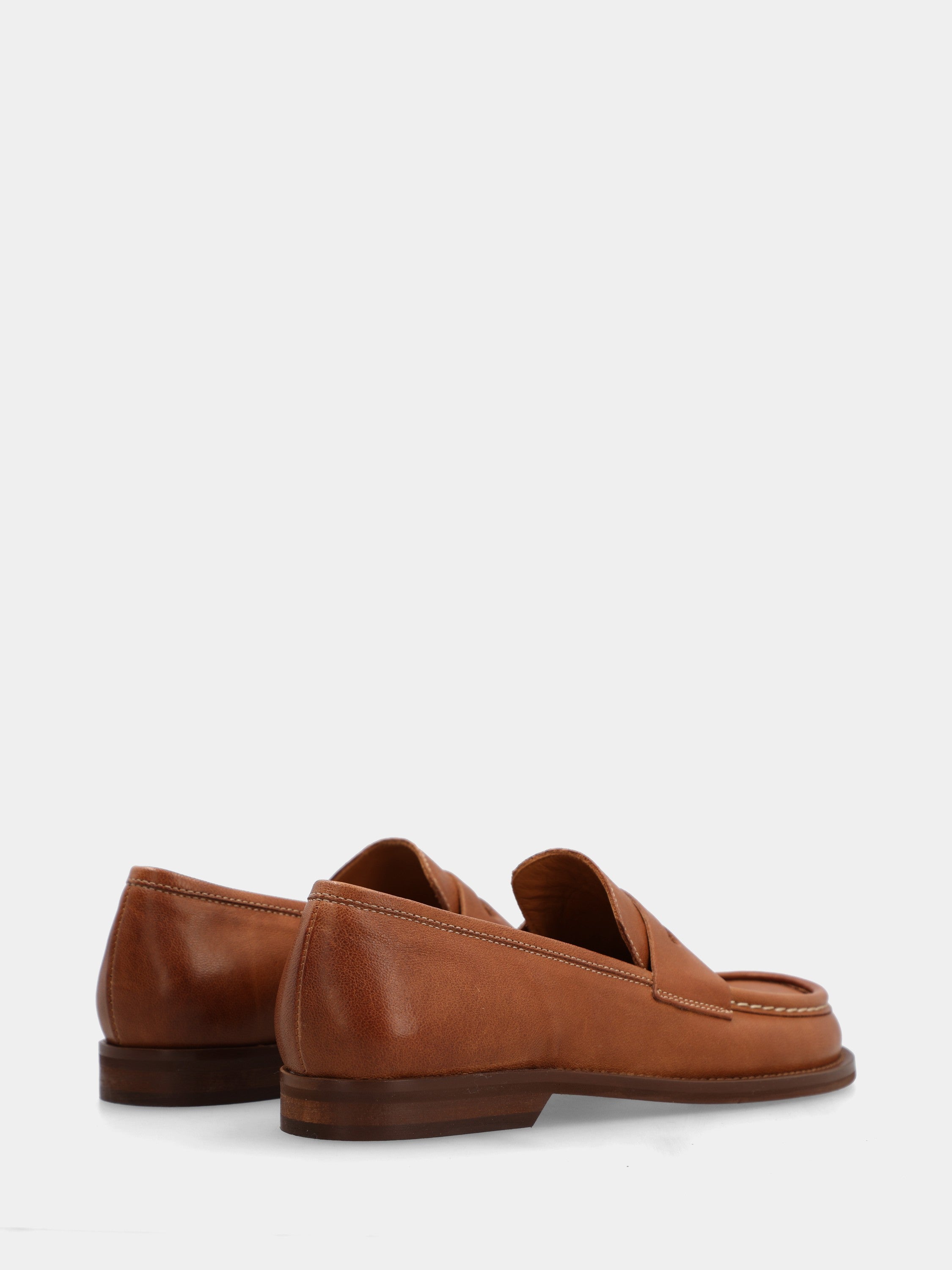 Leather-colored calf moccasin with lion's mouth mask