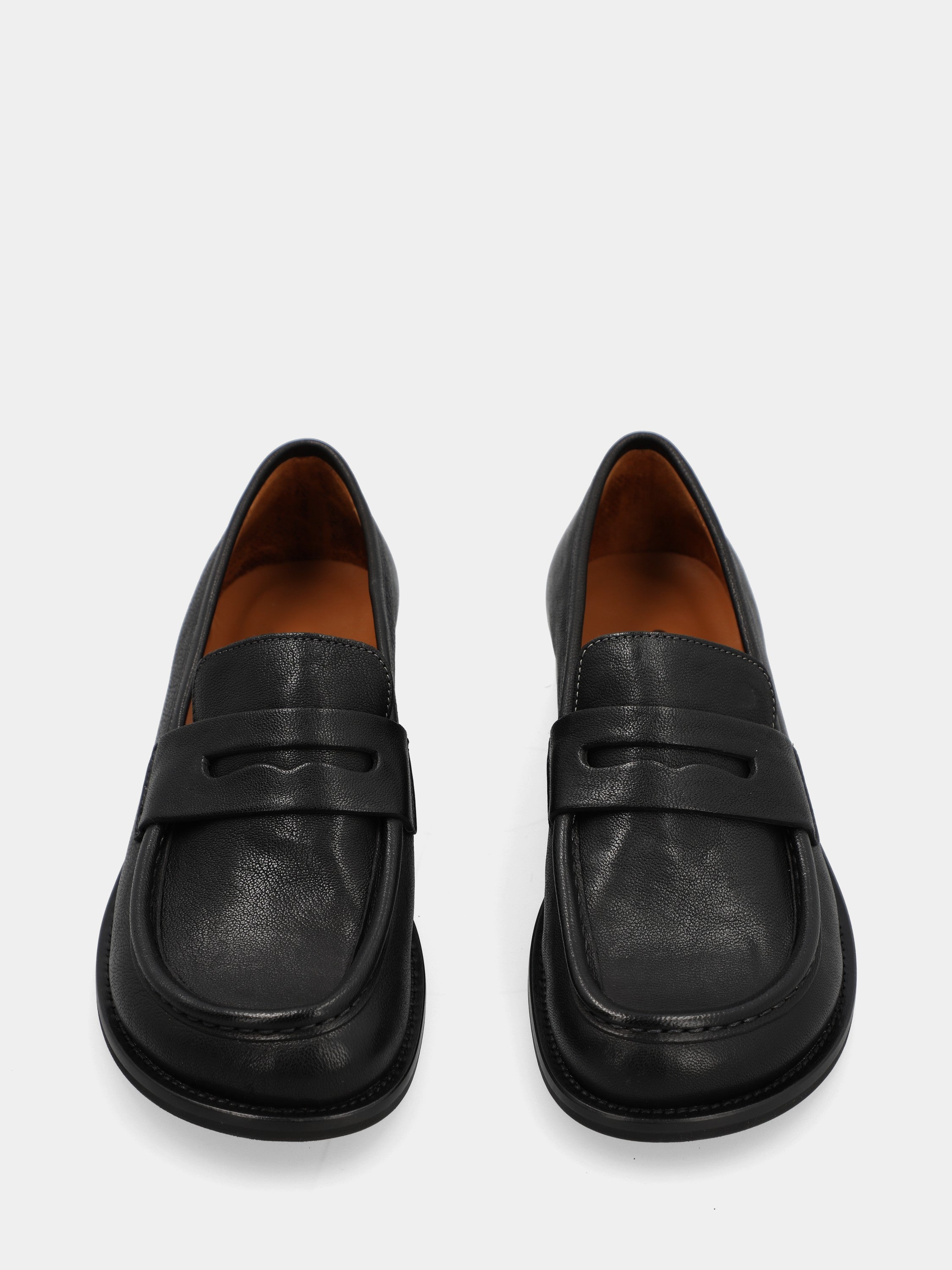 Black calf moccasin with lion's mouth mask