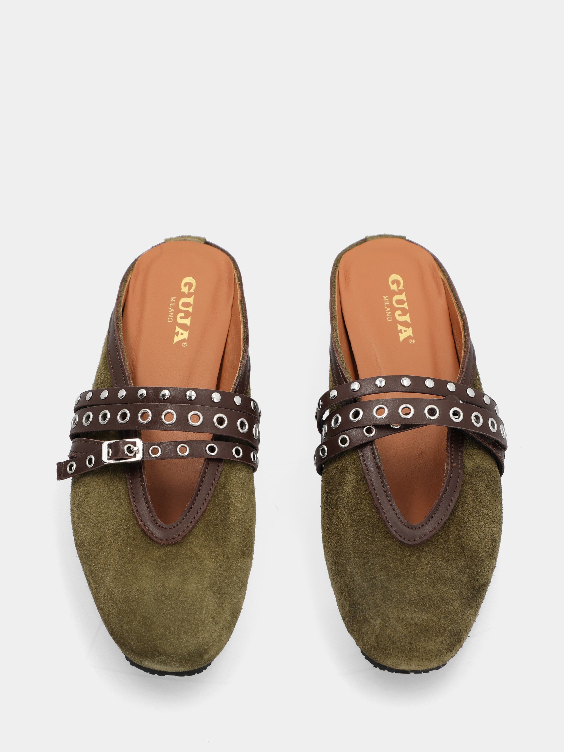Green velour clog with studded straps and flat heel