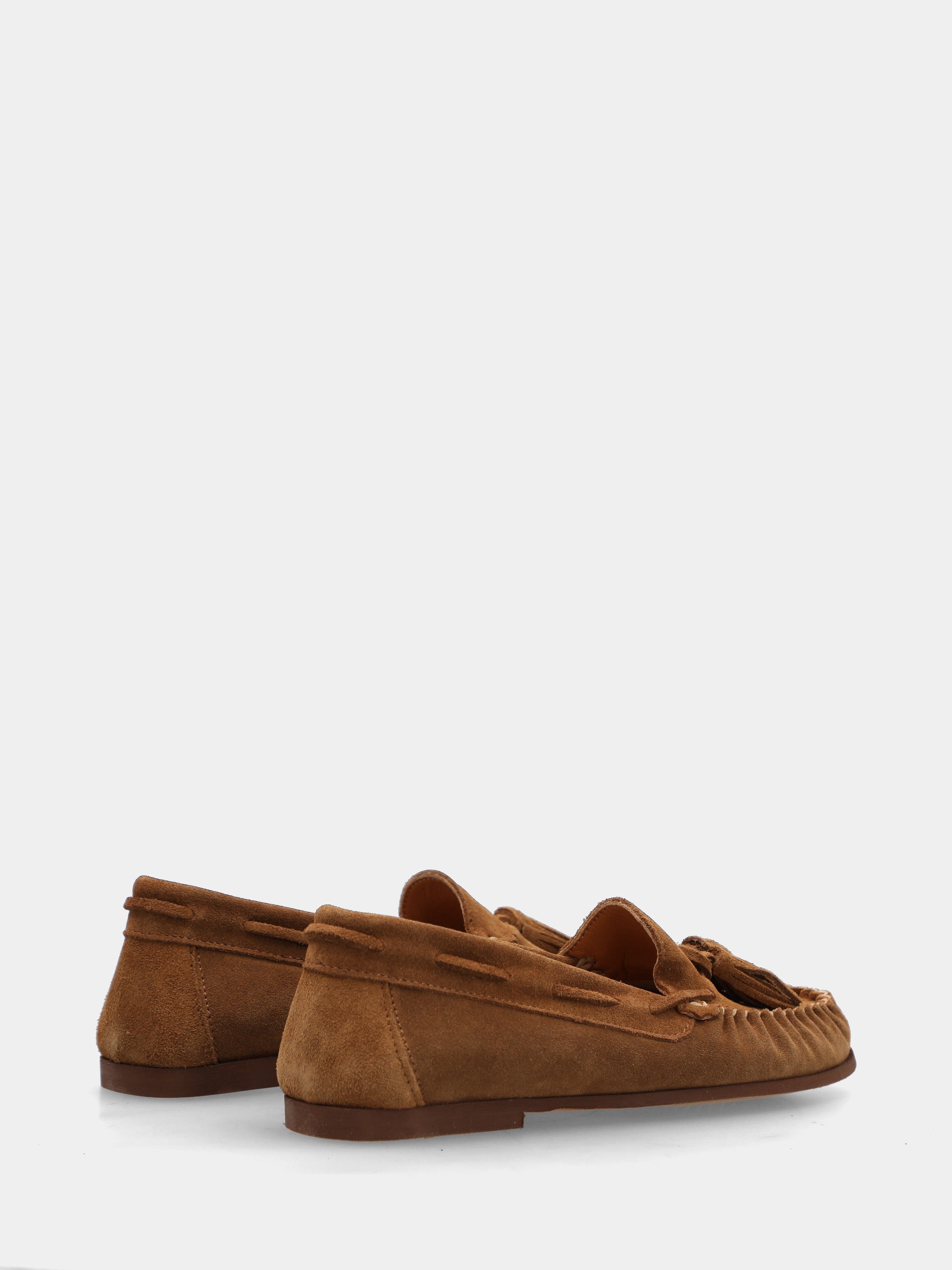 Mocassin en velours couleur cuir avec pompons et bout rond