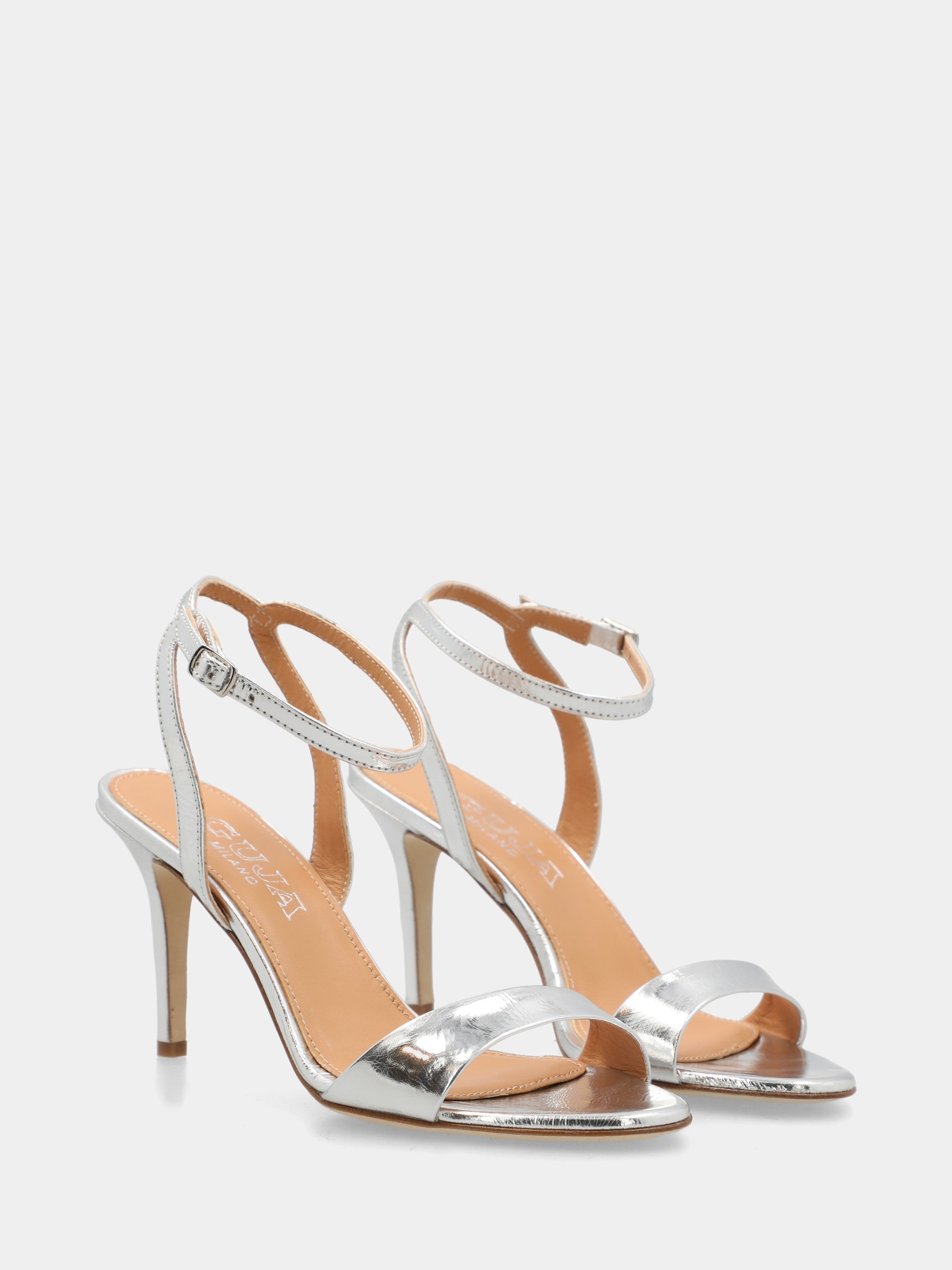 Sandalo in laminato argento con cinturino alla caviglia e tacco stiletto