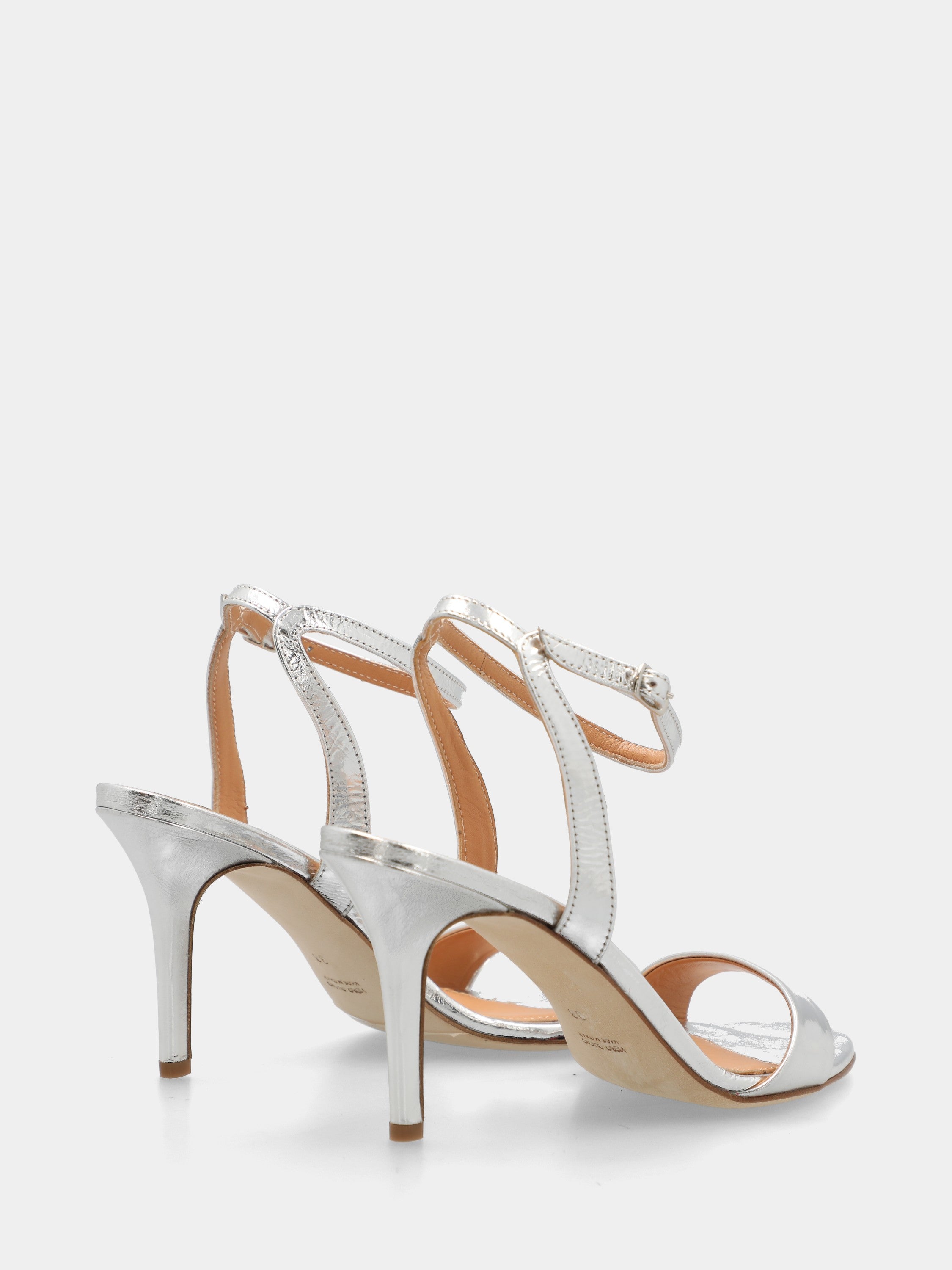 Sandalo in laminato argento con cinturino alla caviglia e tacco stiletto