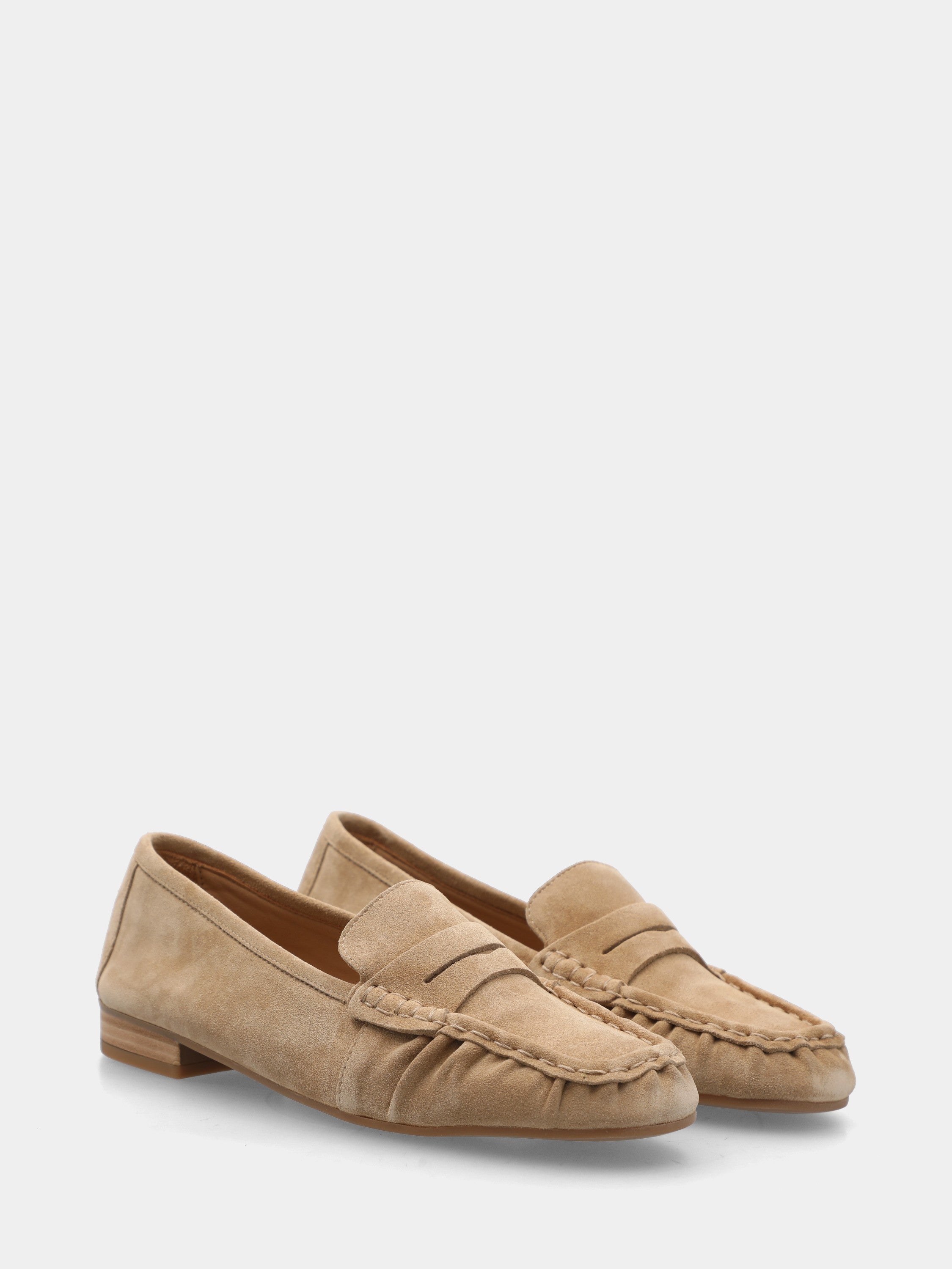 Beige suede loafer with lion's head detail