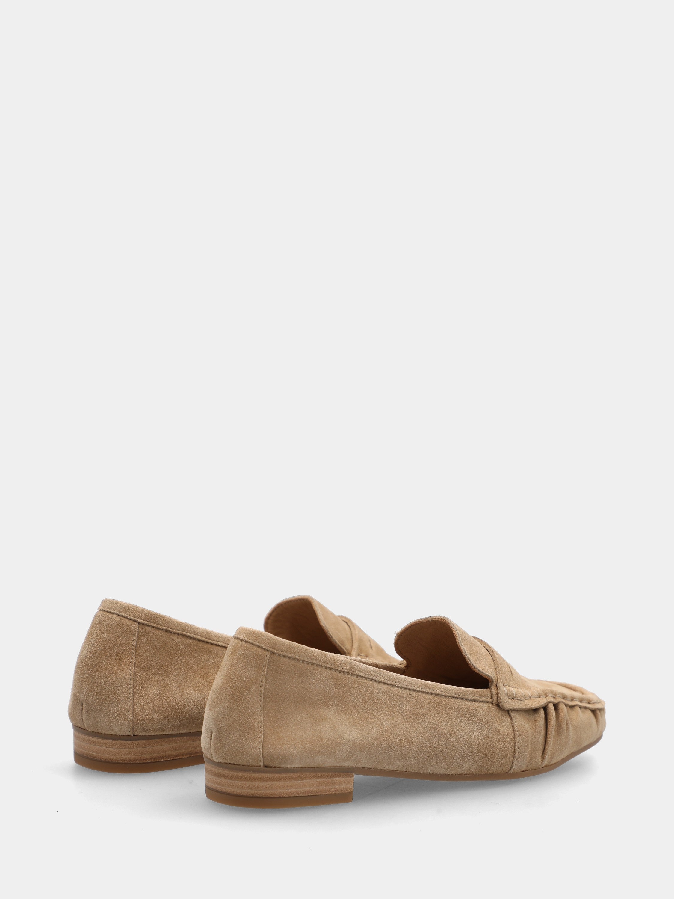 Beige suede loafer with lion's head detail