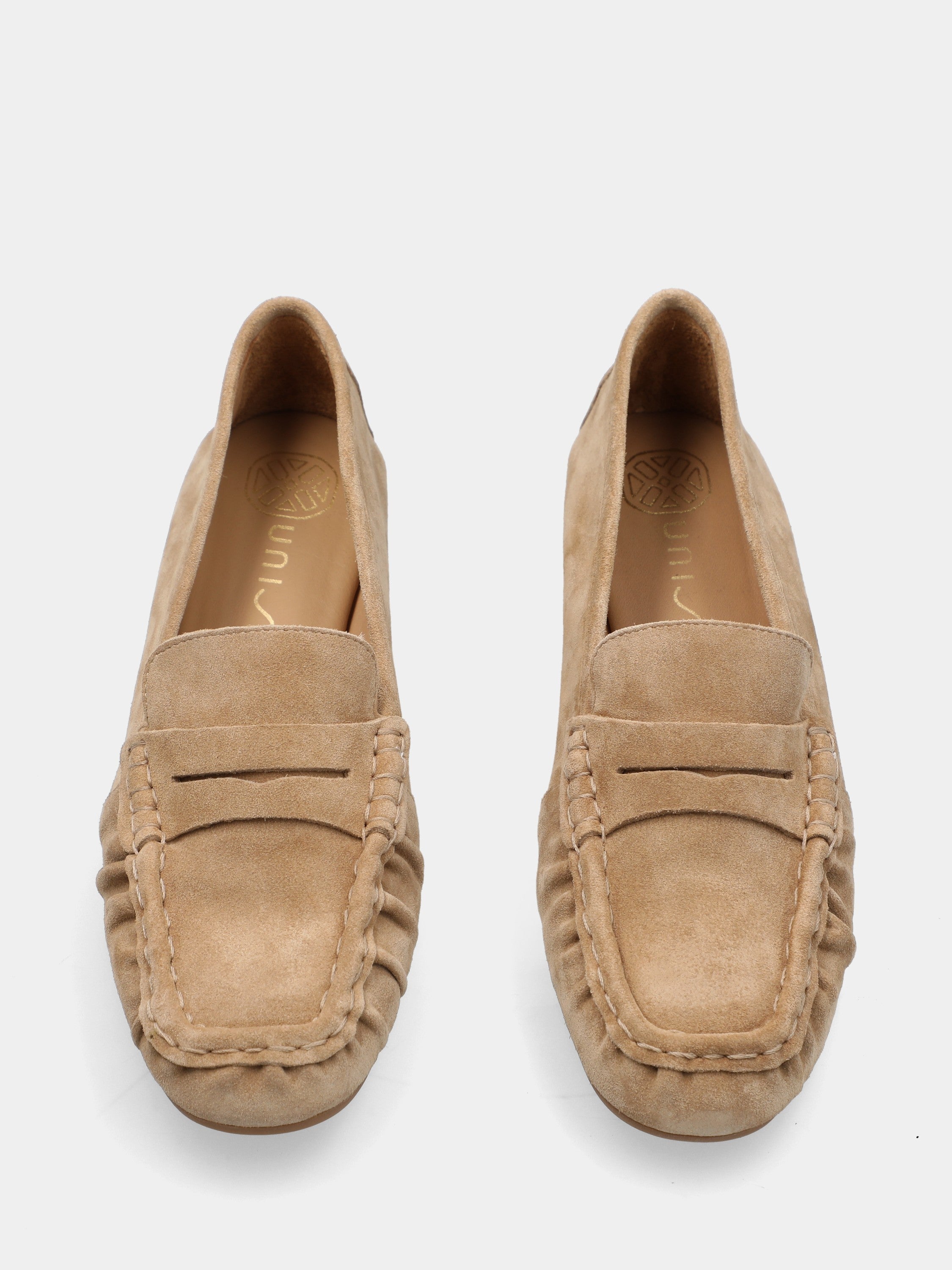 Beige suede loafer with lion's head detail