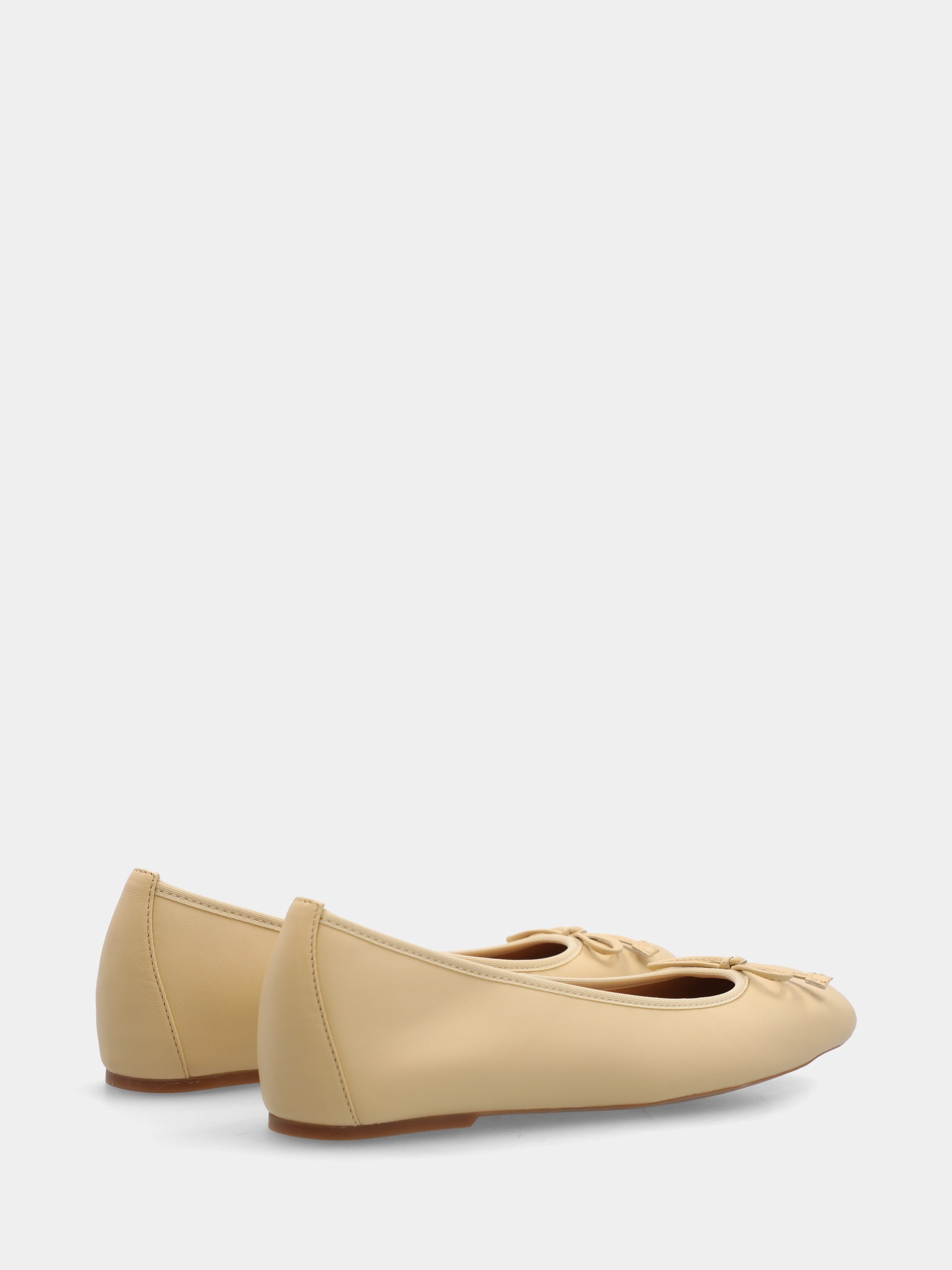 Ballerina in nappa beige con fiocchetto in pianta