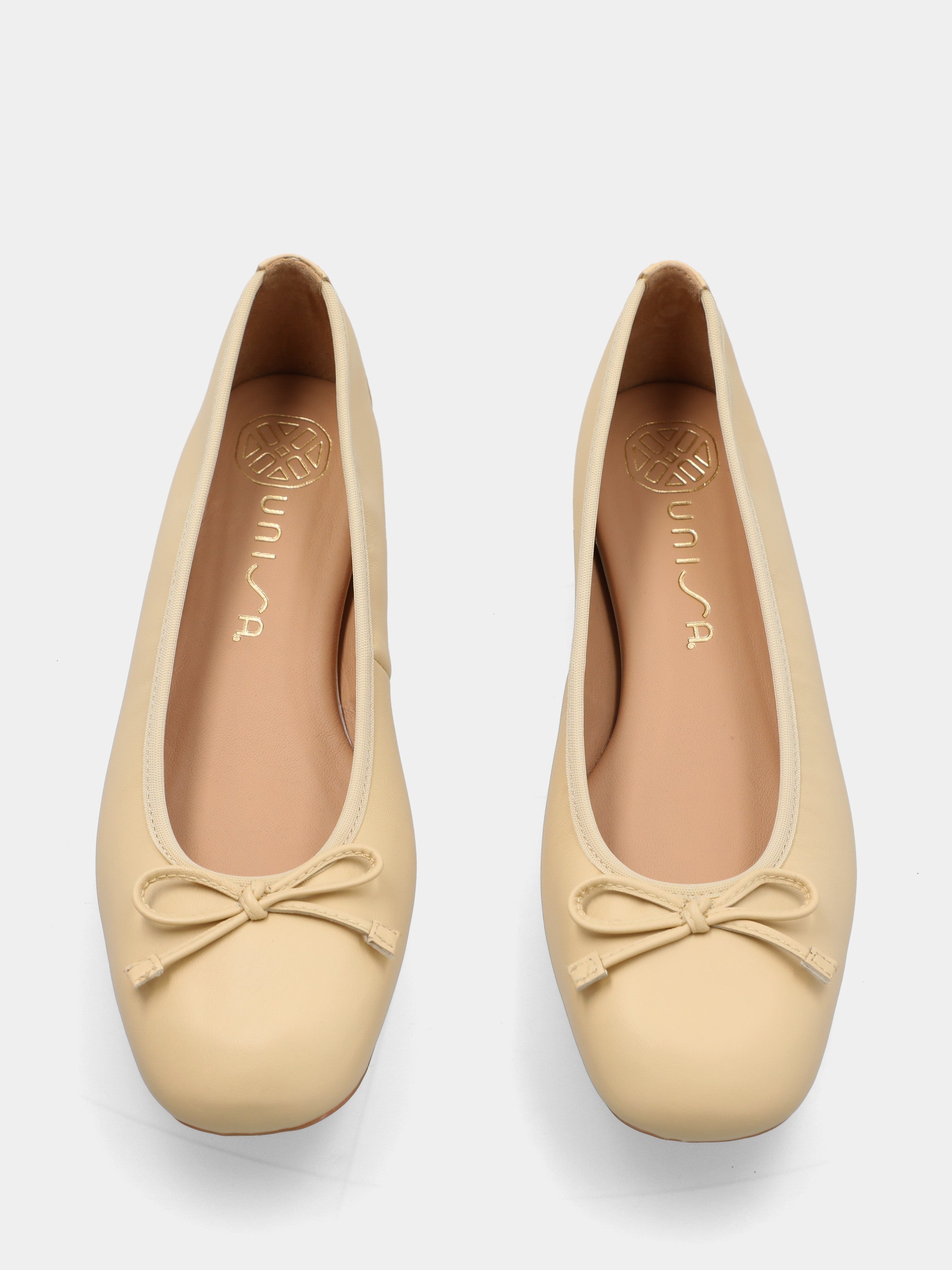 Ballerina in nappa beige con fiocchetto in pianta
