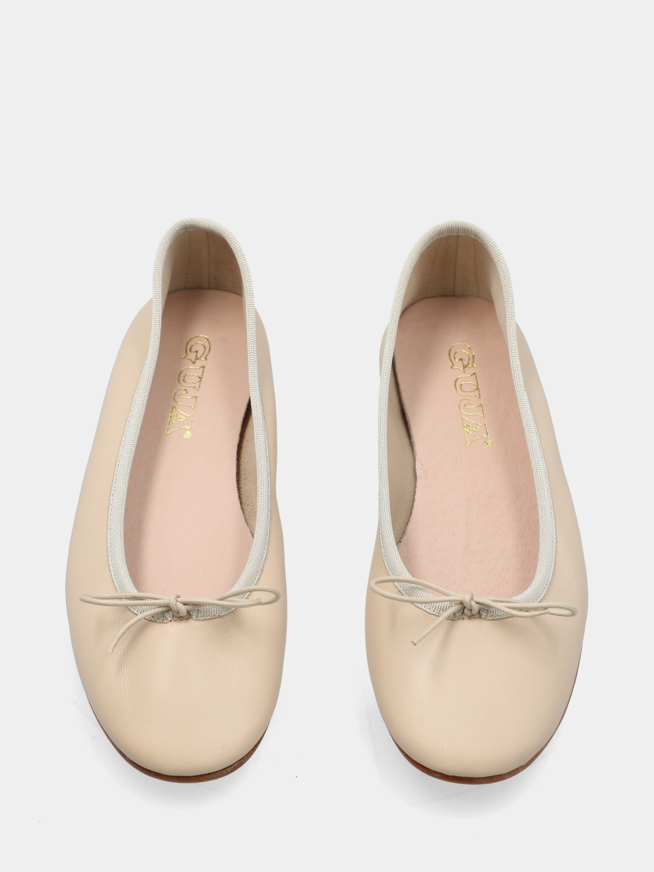 Ballerina in nappa beige con fiocchetto e nastrino tirante