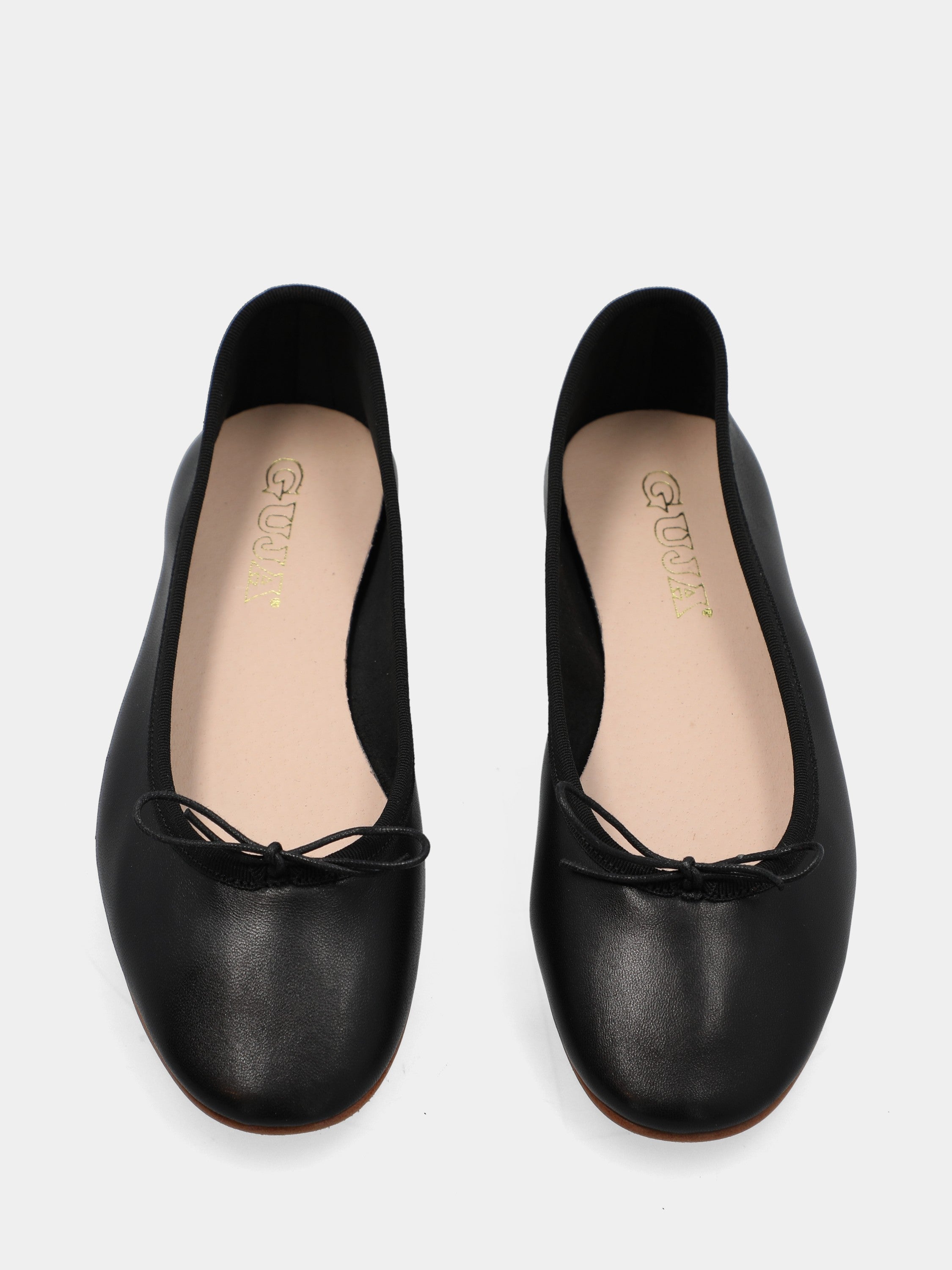 Ballerina in nappa nera con fiocchetto e nastrino tirante