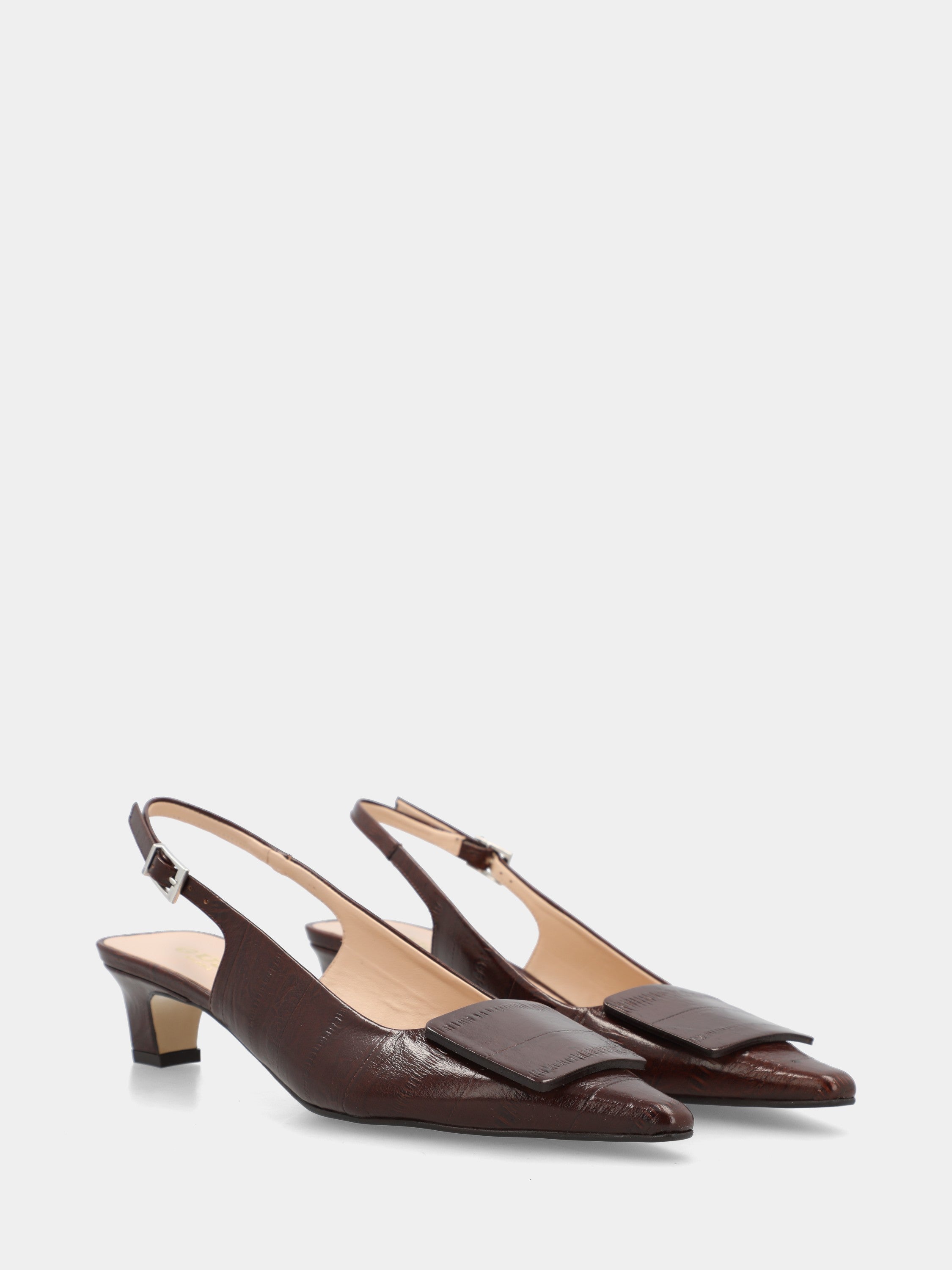 Slingback in dark brown eel-embossed calfskin with tail heel