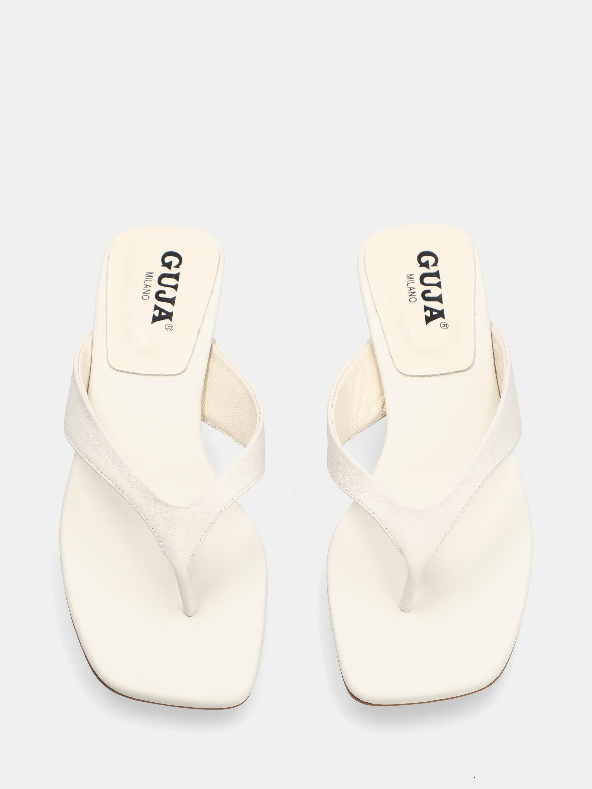 White calfskin thong sandal with cup heel
