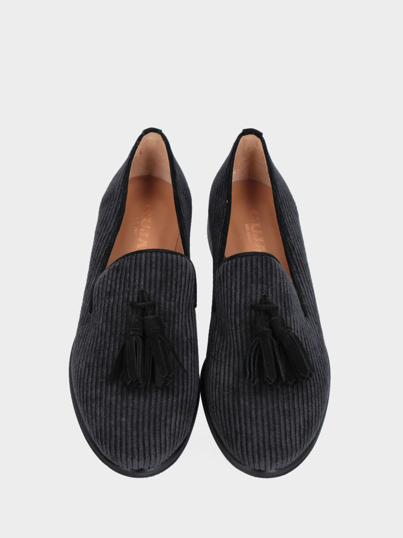 Pantofolina nera in velluto a righe con nappine