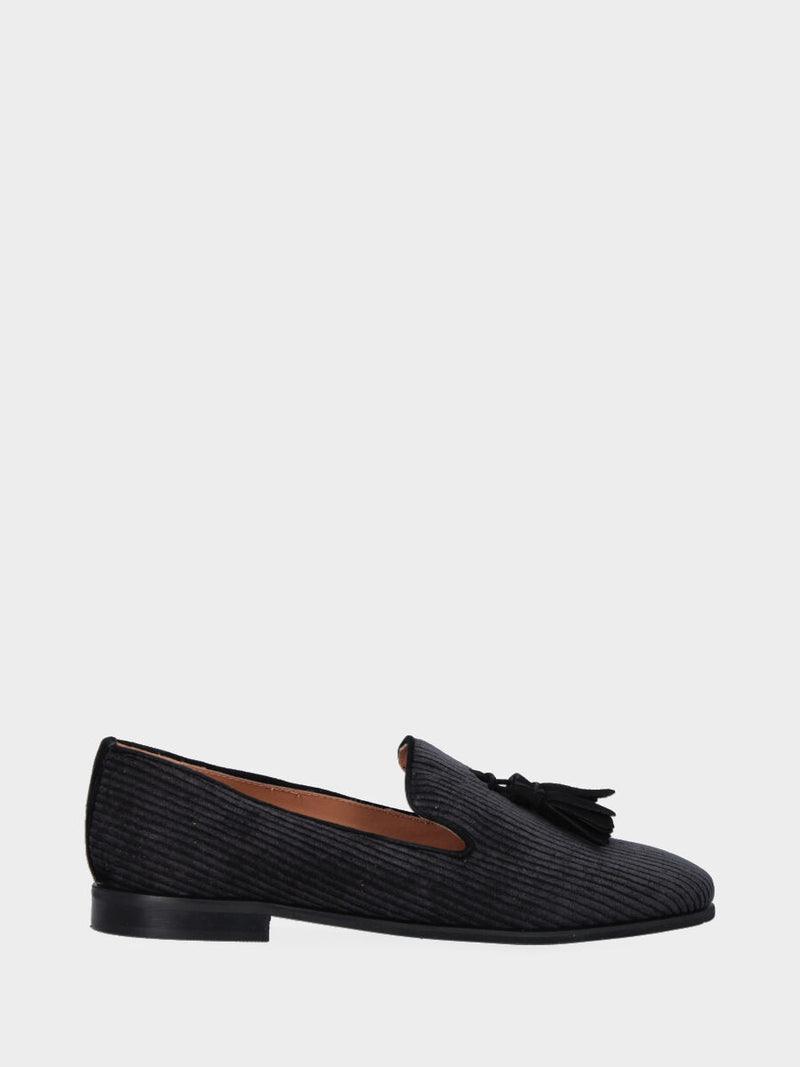 Pantofolina nera in velluto a righe con nappine