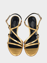 Sandalo laminato oro con listini e tacco a stiletto
