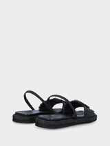 Sandalo nero in fibre naturali con accessorio gioiello