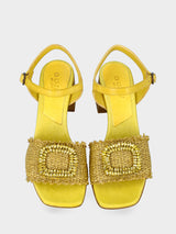 Sandalo giallo in fibre naturali con accessorio gioiello
